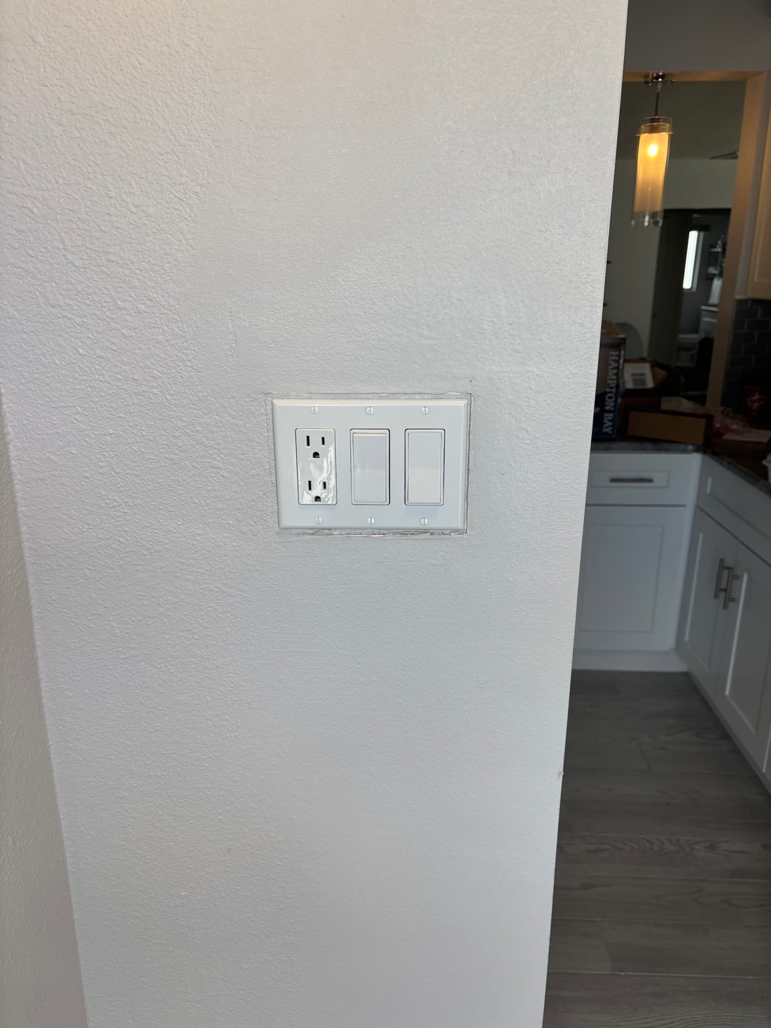 Install light box in place of old exhaust fan 
Install customer provided light 
Remove switches and receptacle and replace with customer provided devices 