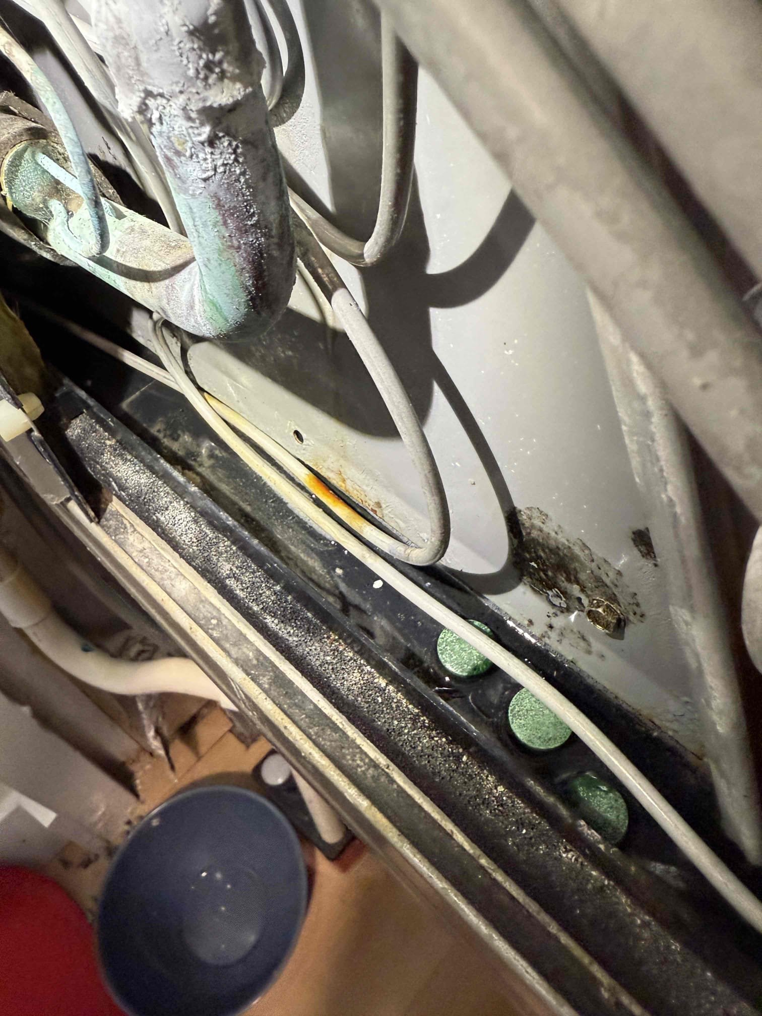 Performed drain cleaning on system. System is cooling at this time. 
System capacitor is out of tolerance limit and should be replaced. Contacter is rusted and corroded and should be replaced. Evaporator coils are severely impacted with debris and require cleaning. System was under water from previous hurricane. Recommending replacement of system. Sent over quotes for replacement. 