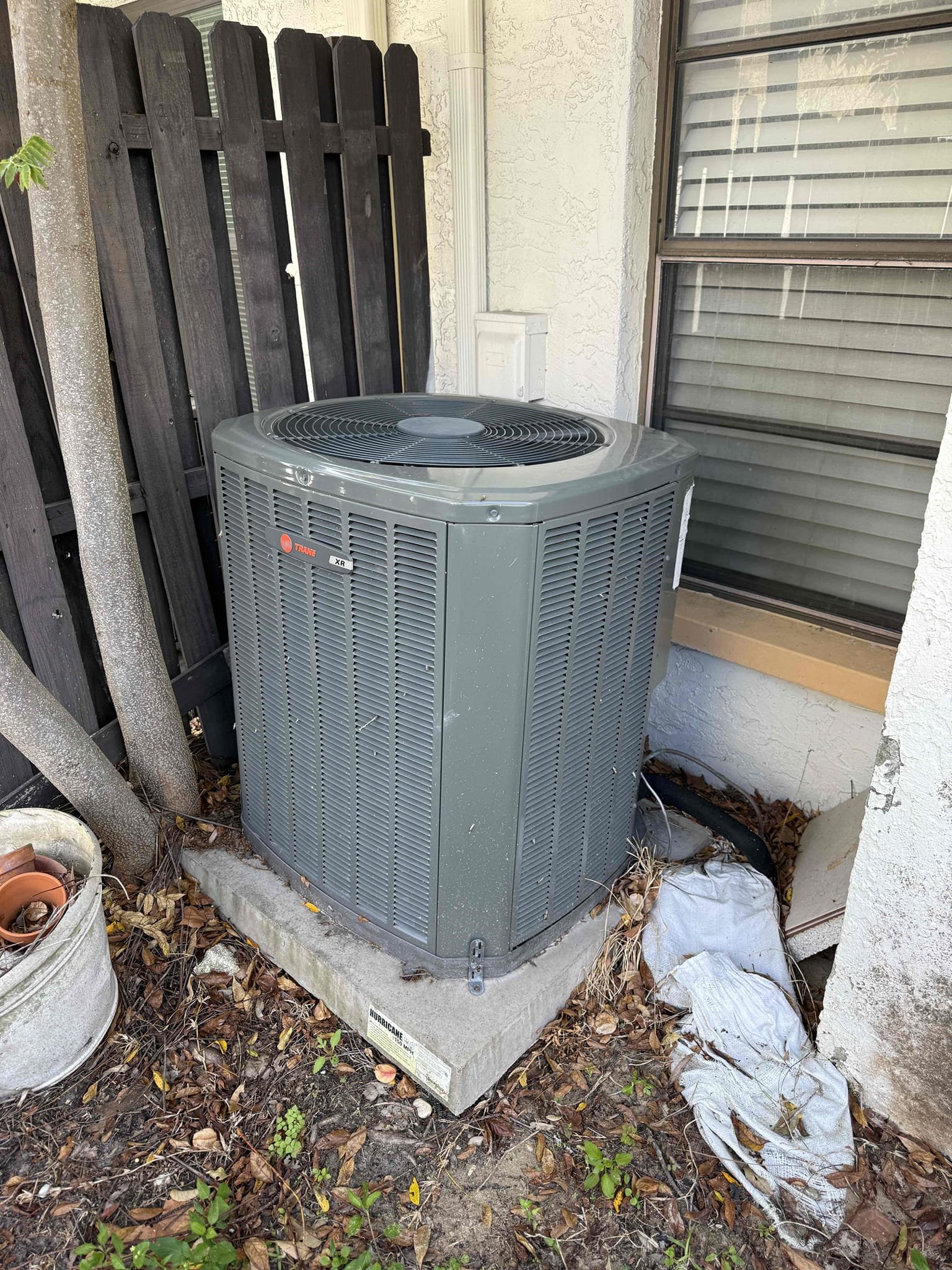 Performed Maitenence on system. Cleaned/treated drain line and primary drain pan. Cleaned condenser coils. Evaporator coils are clean. Verified safety float switch functionality. Checked amp draw on compressor. Checked amp draw on fan motor. Checked capacitor is not within factory range. It is 12% out of factory spec with a tolerance of 10%. Will address this repair after blower motor on air handler is replaced first. Made sure all connections are tight. System is not cooling at this time due to a bad evaporator blower motor. Coils were frozen up on arrival. Quote sent for blower motor replacement. 

Inspected duct work. Ducts are old and have a few bad connections. Visible growth mainly inside two supply duct boots in kitchen and spare bedroom. Recommending duct replacement for proper balance of air flow in home and to remove as much moisture issues as possible. 