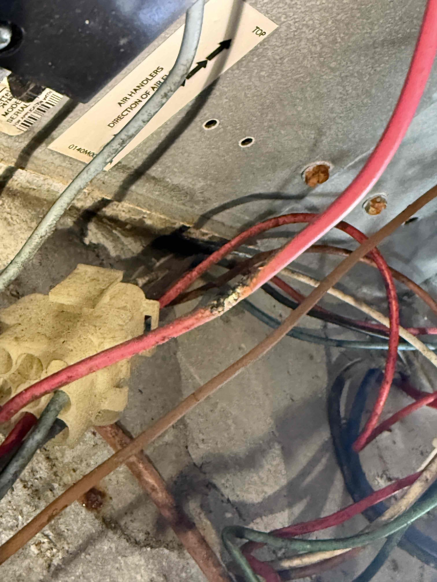 Upon my inspection, found low voltage fuse popped. Replaced fuse and tested cooling. System cools. Switched system to heat and fuse popped. Diagnosed bad contactor. Also found high voltage wire going to control board was fried in one section. Replaced contactor and repaired wire. System heats properly at this time. 
Inspected coils and evaporator coils are very badly impacted with debris. Coils need to be replaced or system replacement. Client would like to wait to replace system at this time. 