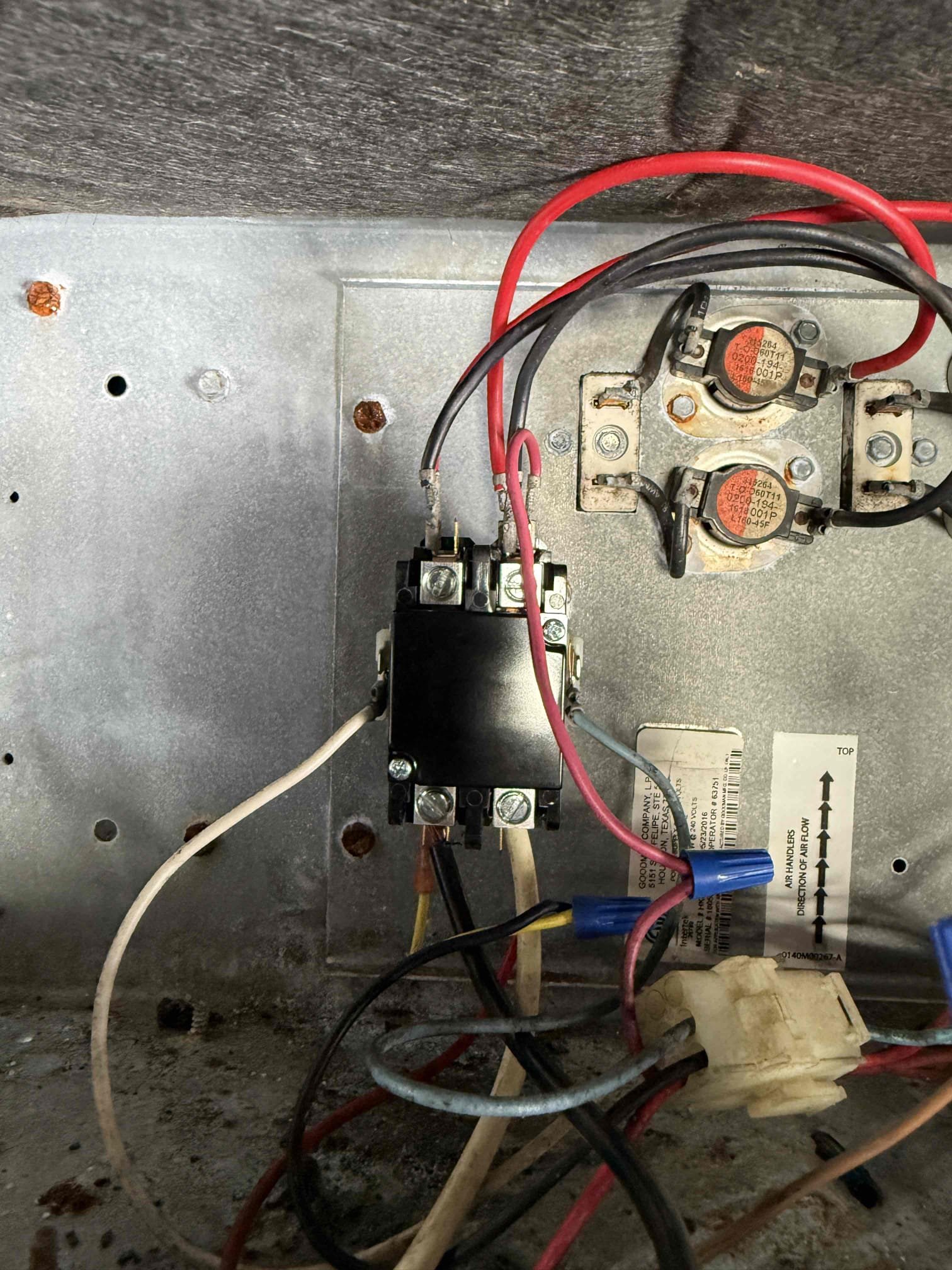 Upon my inspection, found low voltage fuse popped. Replaced fuse and tested cooling. System cools. Switched system to heat and fuse popped. Diagnosed bad contactor. Also found high voltage wire going to control board was fried in one section. Replaced contactor and repaired wire. System heats properly at this time. 
Inspected coils and evaporator coils are very badly impacted with debris. Coils need to be replaced or system replacement. Client would like to wait to replace system at this time. 
