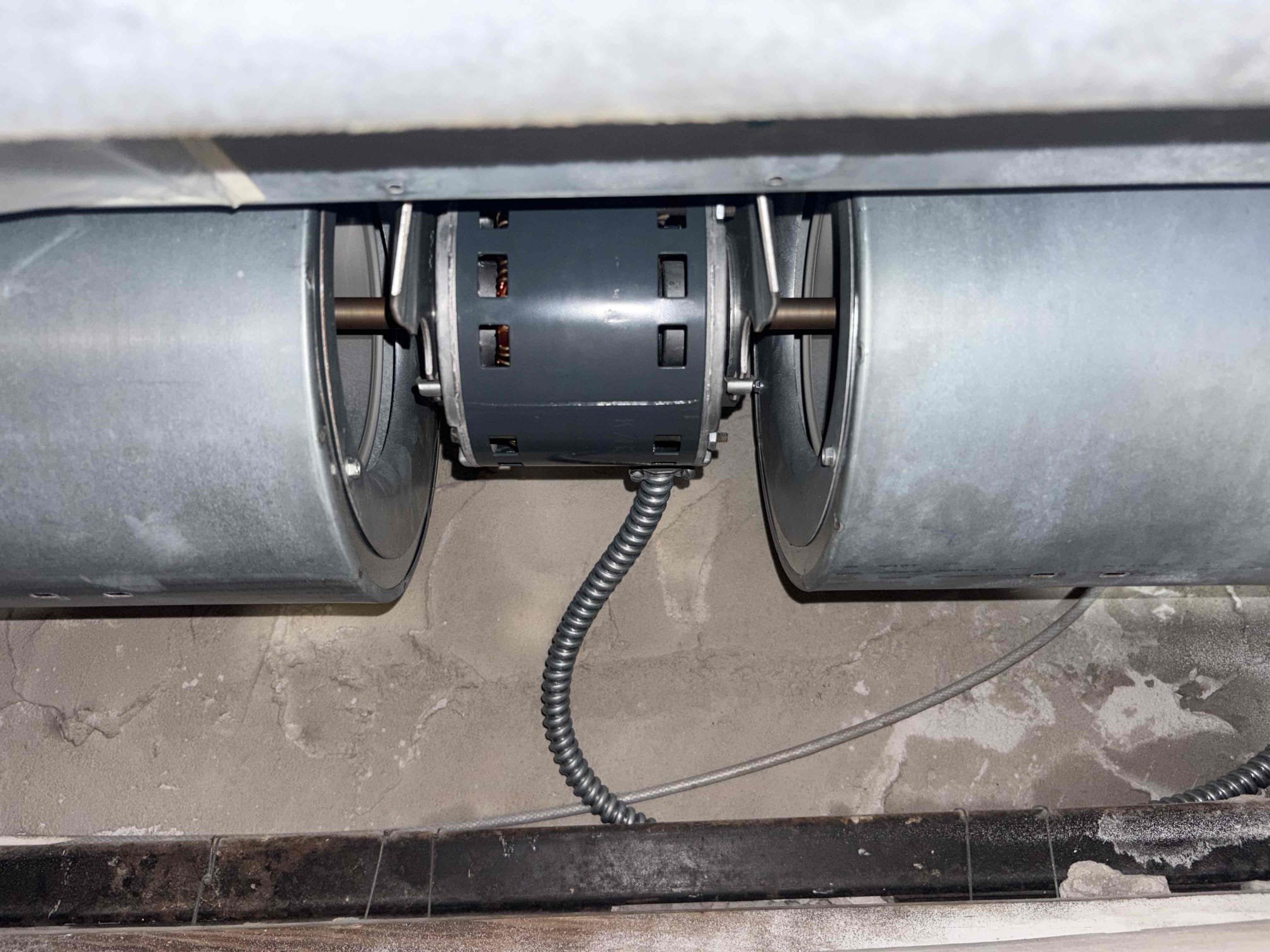 Home owner recommended by building manager for us to come out and bleed air from unit. Bled the unit until water came out. Air is out of system. Home owner also states unit will make loud banging noise. Explained that the actuator valve may need to be replaced. Also have buildup in drain pan. Would recommend having system maintenance. Unit is currently cooling.  

System met temp at 65° during visit. Was not able to imitate sound described. 