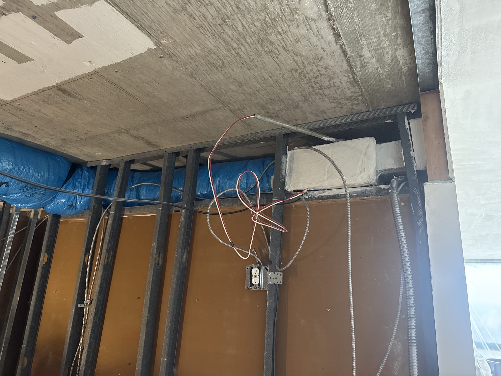 Remove Current Trunk Line (Kitchen)
Run Duct-board Against Back Wall (High and Tight)
Duct Board to Living Room Transition 
Ductboard to Kitchen Transition 
Ductboard to Bathroom Transition (Flush Against Wall)
4” Bathroom Duct & Collar Ran Behind Studs (Mounting Fan Flush)
White Ceiling Registers 
Seal & Strap Ducting  