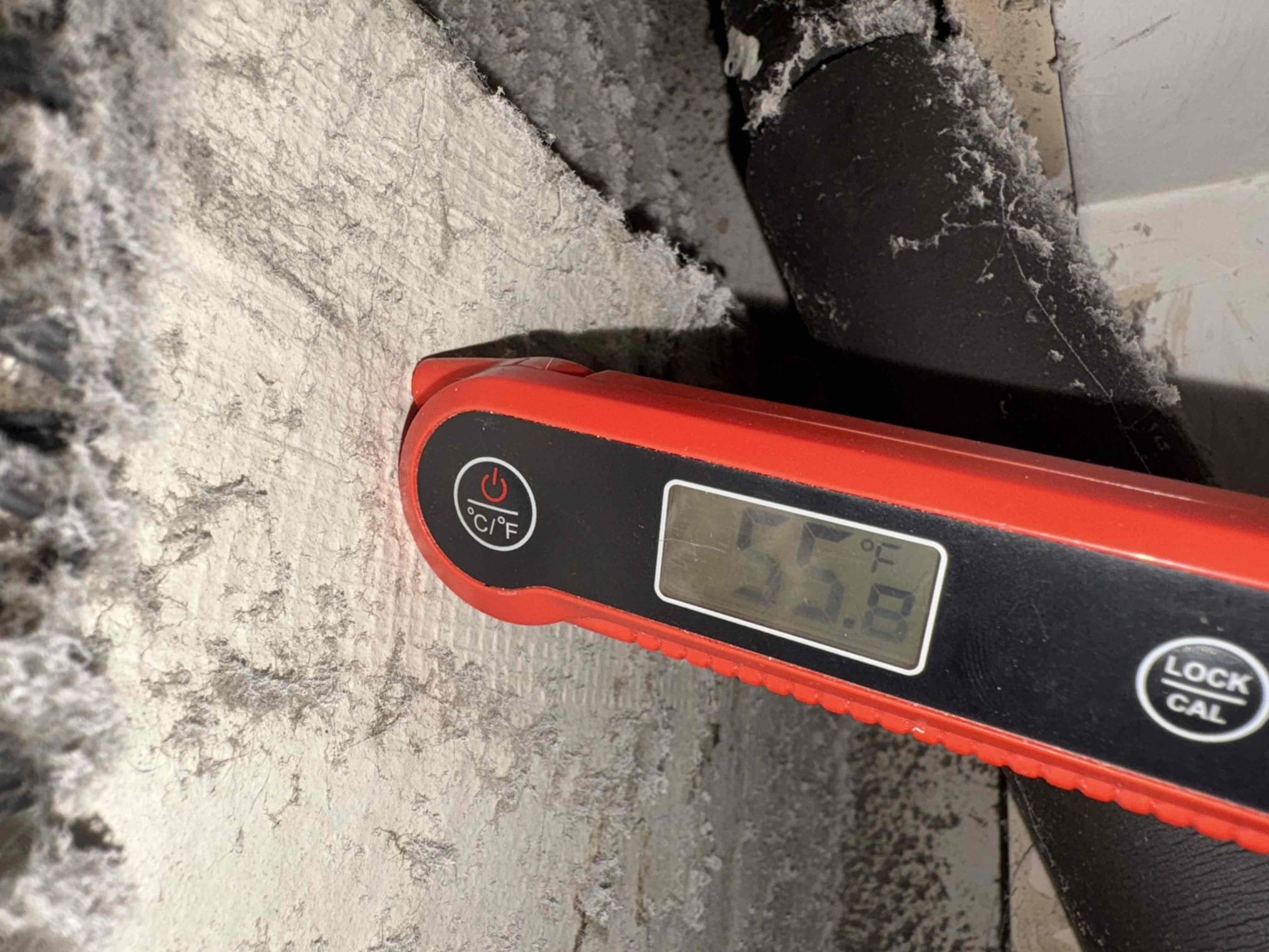 Drain pan backed up causing unit to overflow. Drain line not glued properly. Cleared pan and glued joints. Verified system operations 