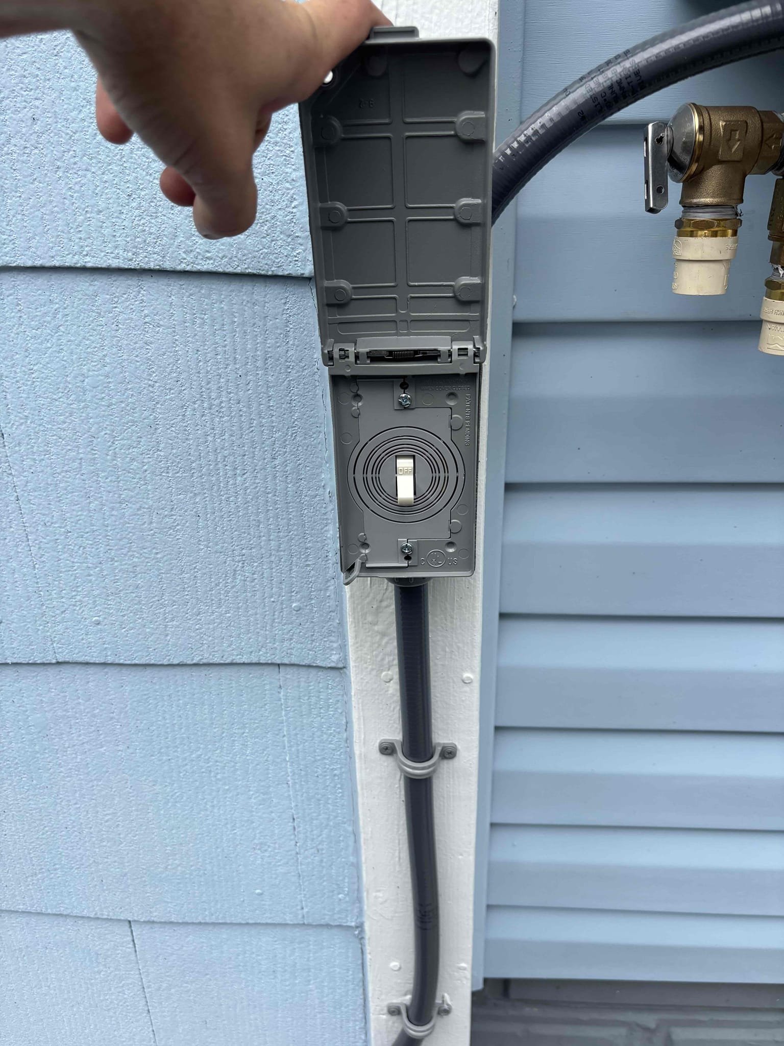 Install electrical to to gas tankless water heater 
Install disconnect switch 
Install GFCI breaker 