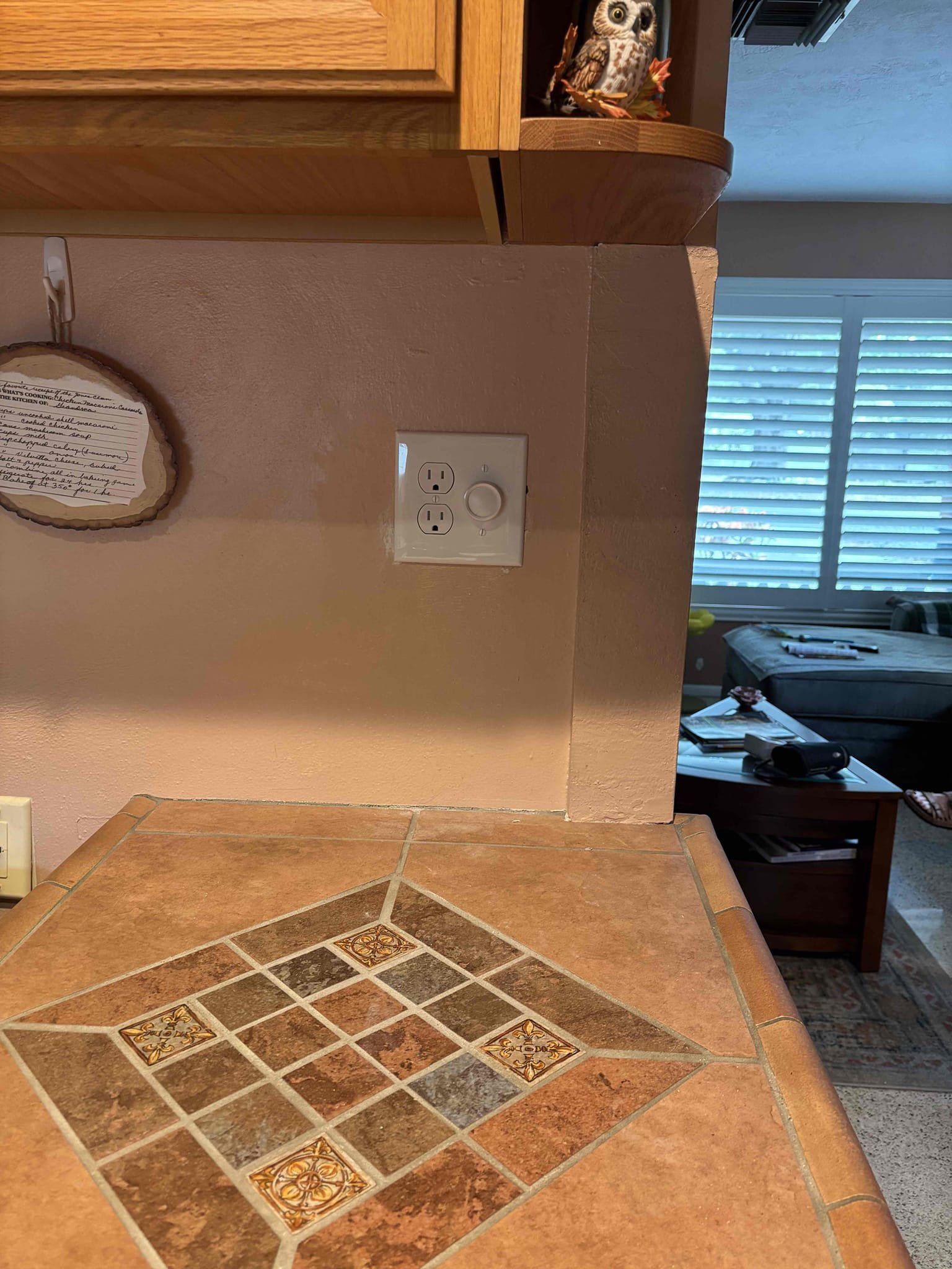 Remove receptacle beside switch in kitchen run a new line from an existing receptacle 
Remove single gang switch box and install a 2 gang cut in box 
Had to rework junction box in the attic that was drywalled over to it a safe connection 