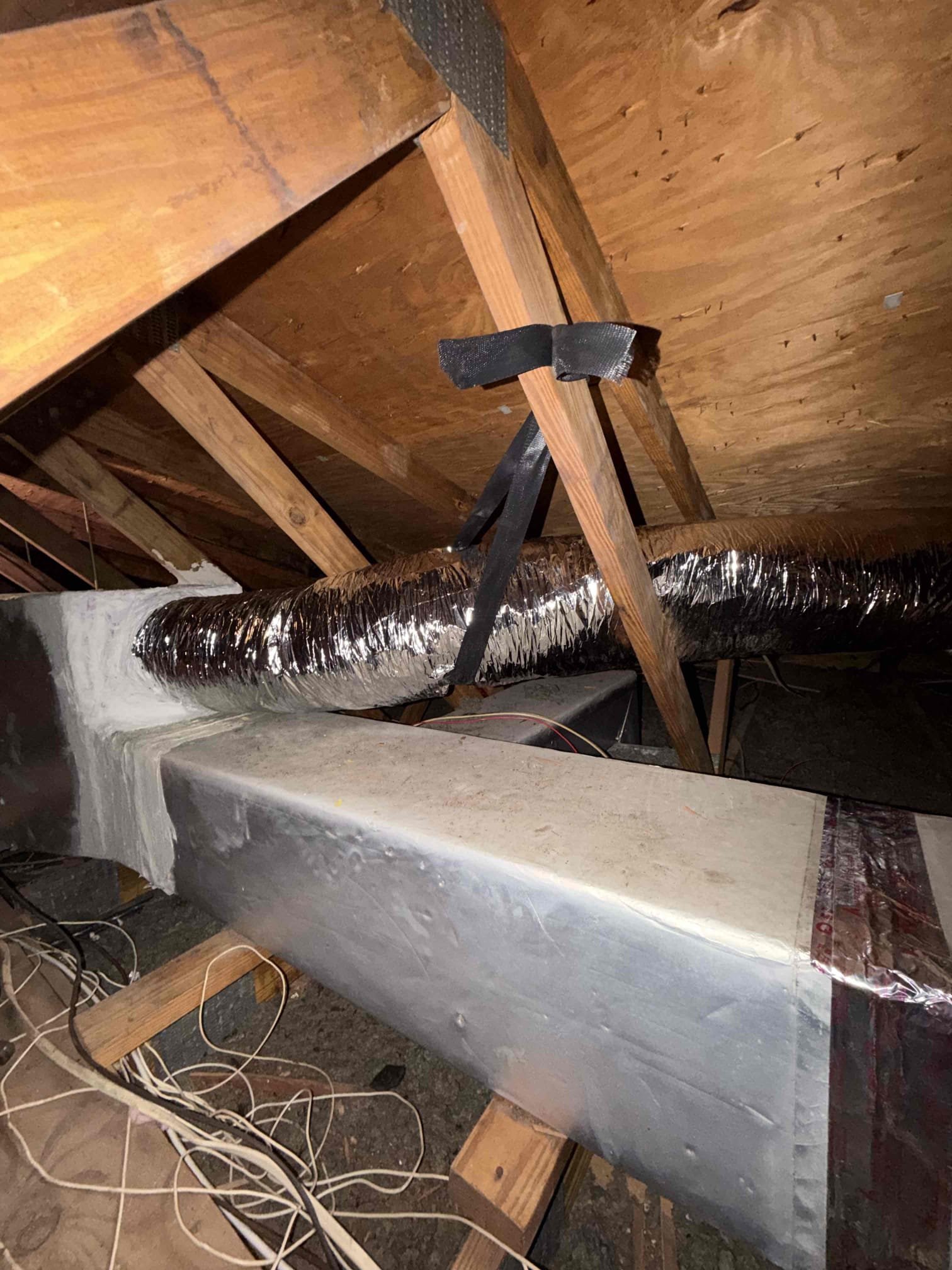 Replaced and sealed duct system, relocated living room duct on trunk line