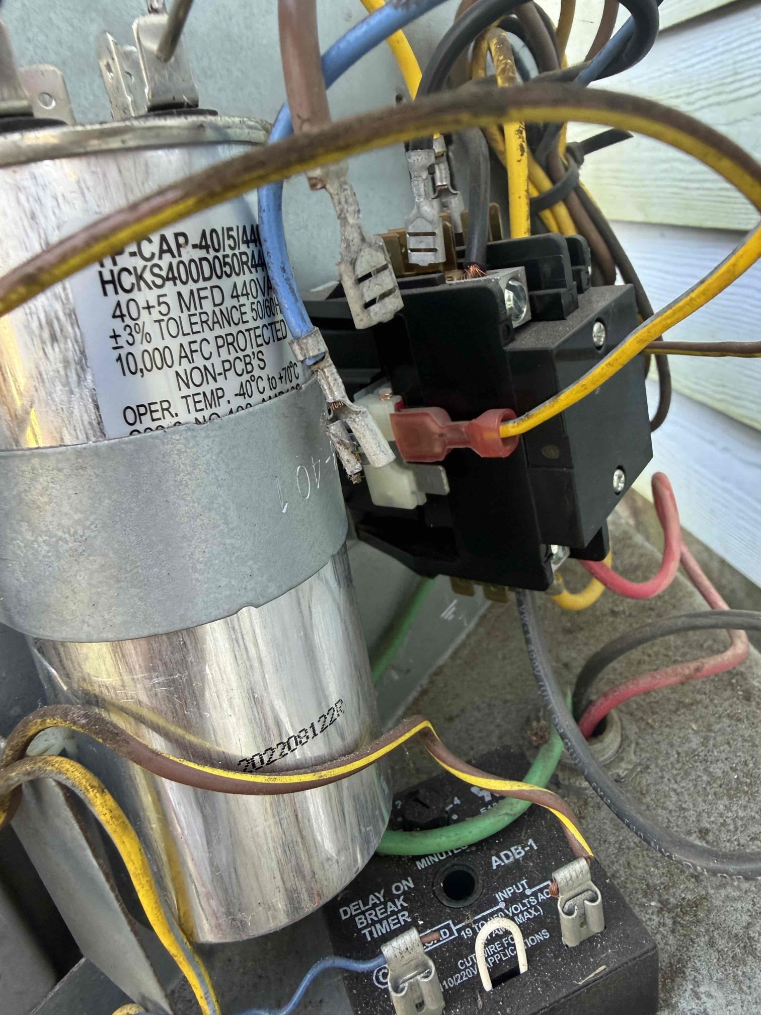 Performed maintenance on system. Cleared pan and drain. Added chemical to pan to help prevent growth. Pressures good. Found weak capacitor and replaced. Electrical checked good. Added primary float switch to unit to prevent leaking water in attic. Rinsed condenser coils. Unit operating properly at this time. 