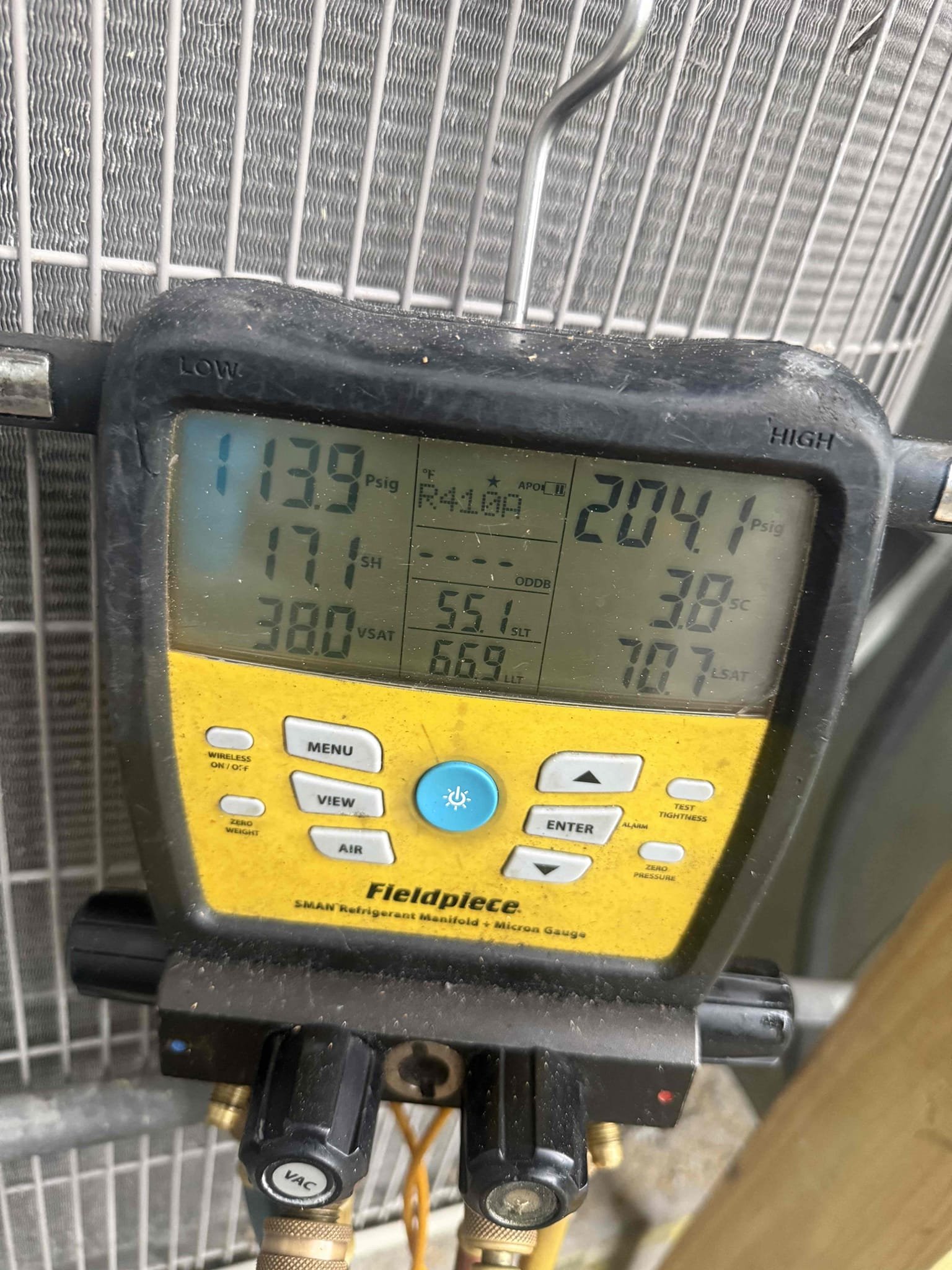 Performed maintenance on main system. Pressures good. Temp split good. Replaced weak capacitor. Electrical checked good. Cleared pan and drain. Added chemical to help prevent growth. Rinsed condenser coil. Unit operating properly. 