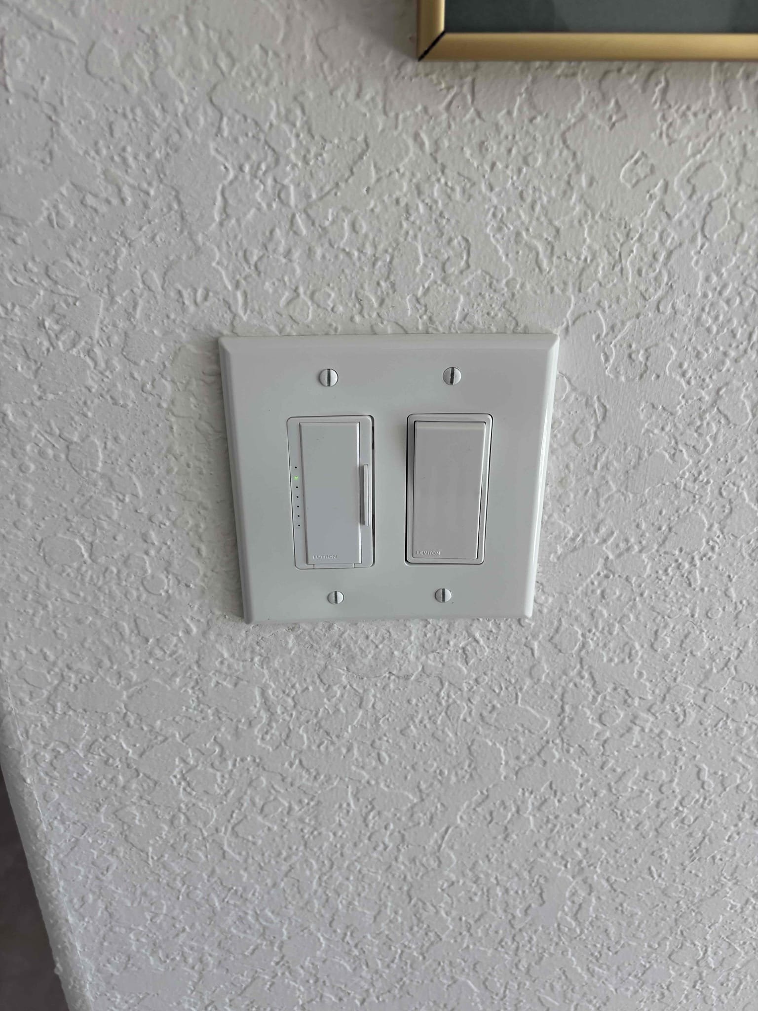 Install customer supplied chandelier 
Install customer provided dimmer switch and standard switch 