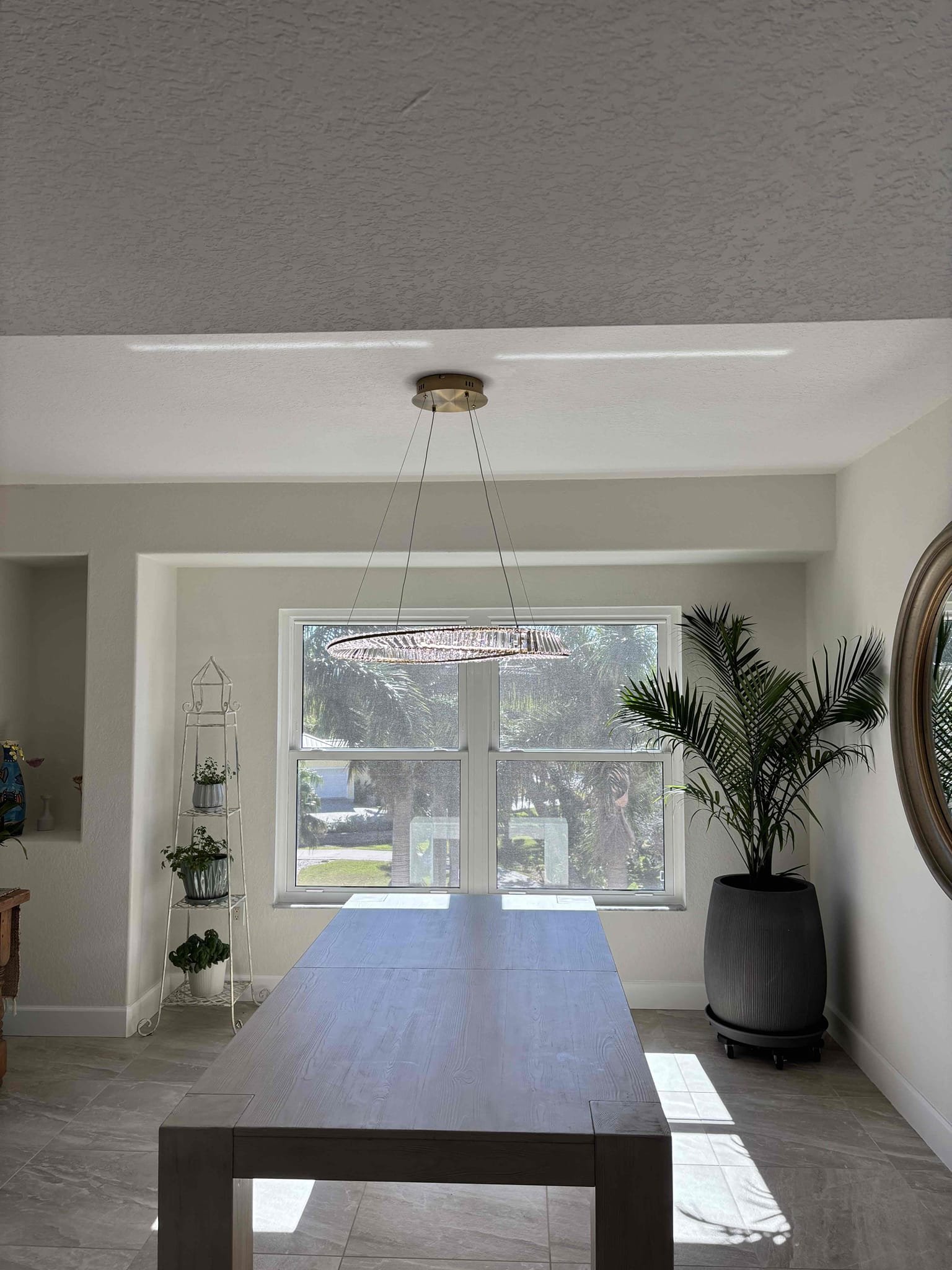 Install customer supplied chandelier 
Install customer provided dimmer switch and standard switch 