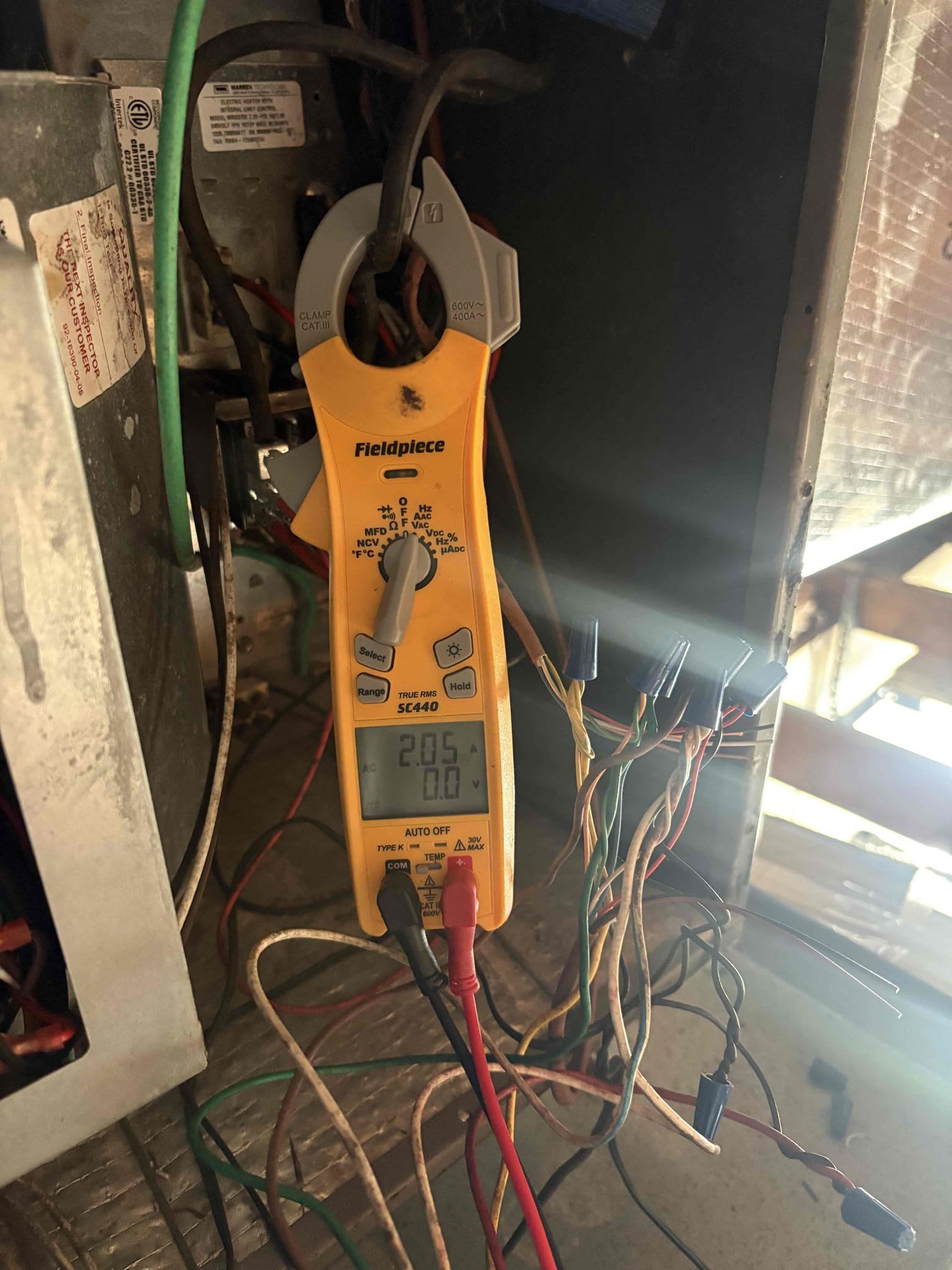 Return to run new Thermosat wire and re wire air handler. After running new wire system running continuously in heat (emergency heat) was solved. Further diagnostic as why heat pump not operating properly in heat. Found outdoor txv failing. System only able to run in emergency heat until outdoor txv is replaced. 