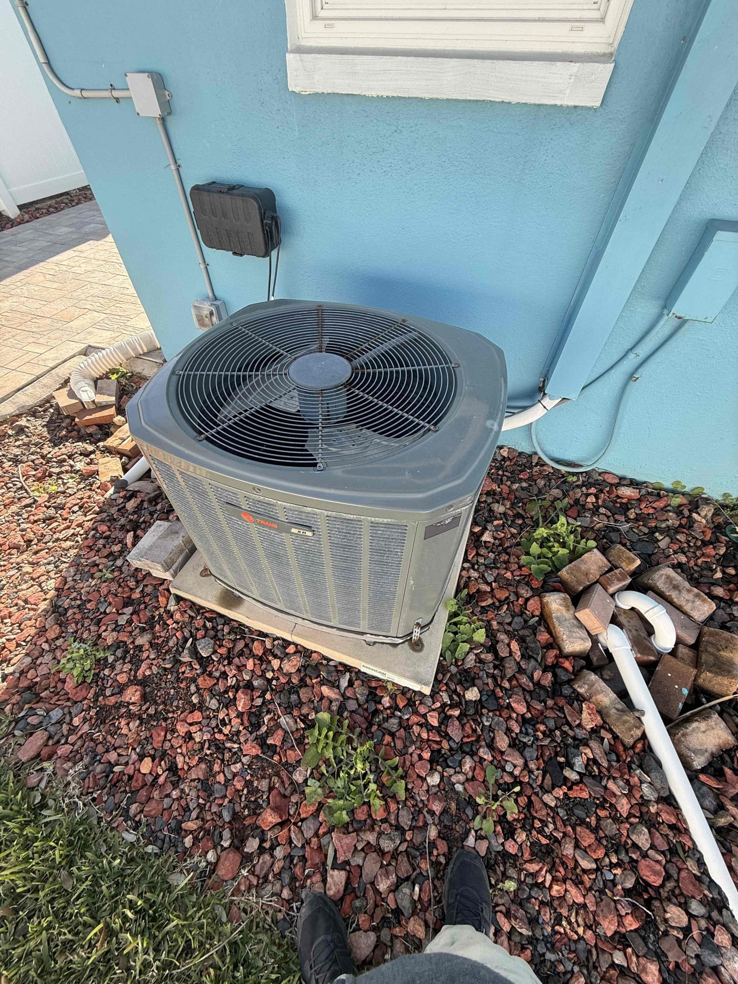 Removed condenser and pad from home. Recovered refrigerant and disconnected electrical. Taped off line set to prevent moisture intrusion. Tax and labor included.