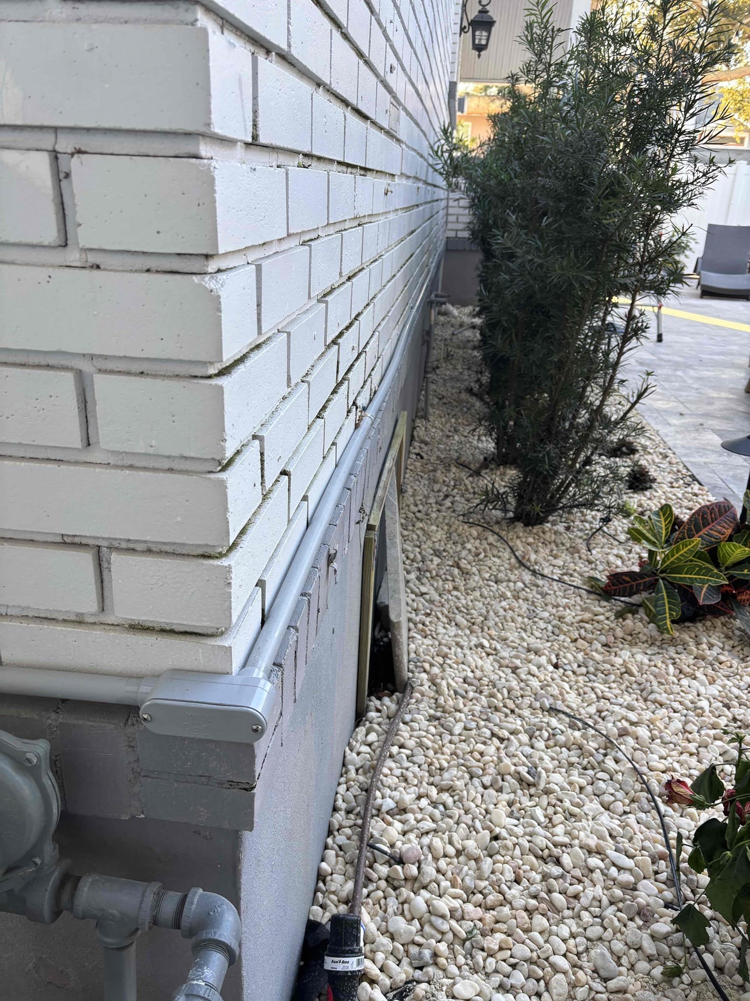 Run conduit exposed on the wall to new outlet location 
Install weatherproof box and in use cover 
Install tandem breaker 
Install weather resistant GFCI 
Adding customer supplied switched recep to GFCI box 