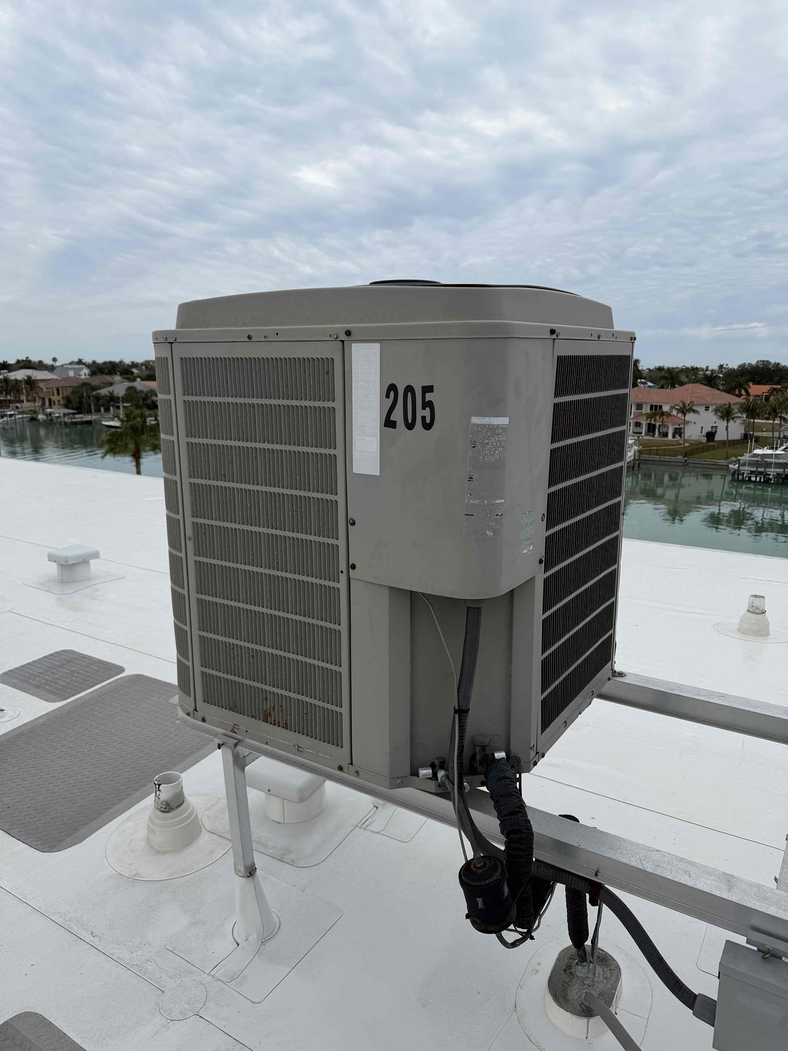 Performed Maitenence on system. Cleaned/treated drain line and primary drain pan. Cleaned condenser coils. Evaporator coils are clean. Replaced client supplied media filter. Verified safety float switch functionality. Checked amp draw on compressor. Checked amp draw on fan motor. Checked capacitor is within factory range. Inspected Contactar. Made sure all connections are tight. System is cooling with a 20° temperature split at this time. System is heating properly at this time. 
Found a rusted and corroded outdoor liquid line filter dryer. This is at risk of leaking refrigerant in the future. 
Found outdoor transformer set to 240v instead of 208v. Left transformer alone as it has been working thus far. 

Found indoor uv light system has gone bad. Replaced entire system. 