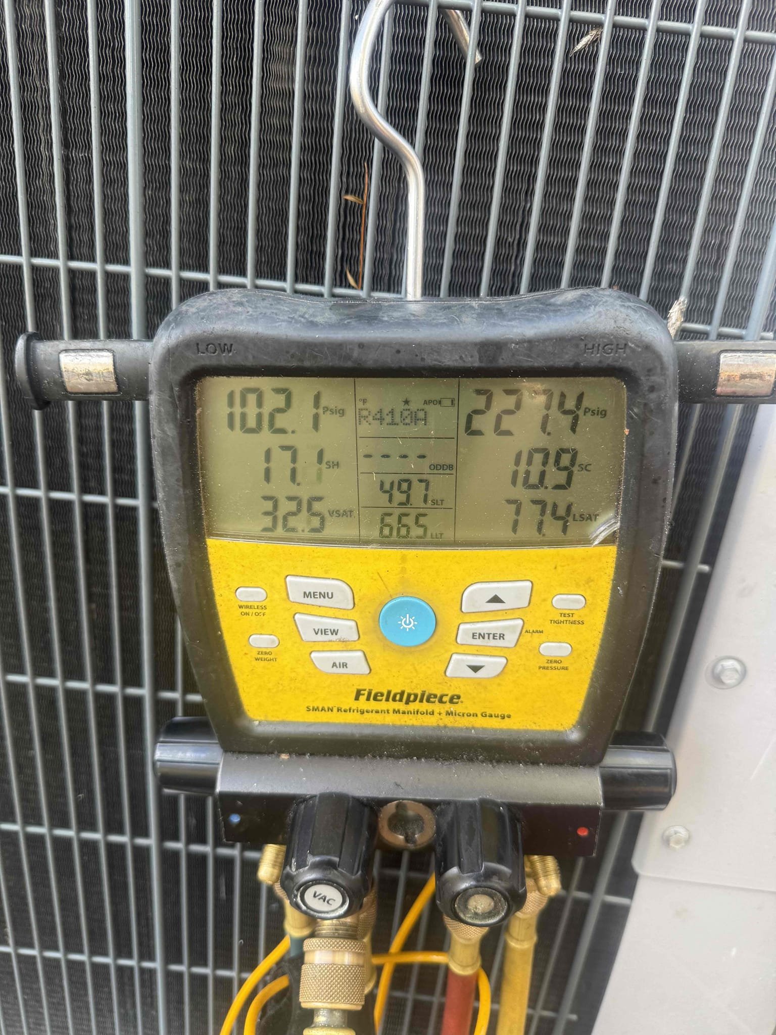 On arrival found unit not cooling due to clogged drain. Cleared drain with vacuum and high pressure nitrogen. Added chemical to pan and drain to help prevent growth. Cleaned in place evap coil due to dust and growth forming on coil. Added 2 lbs of refrigerant to bring unit back to factory specs. Performed maintenance on system. Rinsed condenser coil. Checked all electrical. Temp split good. Pressures good. Unit cooling properly at this time. 