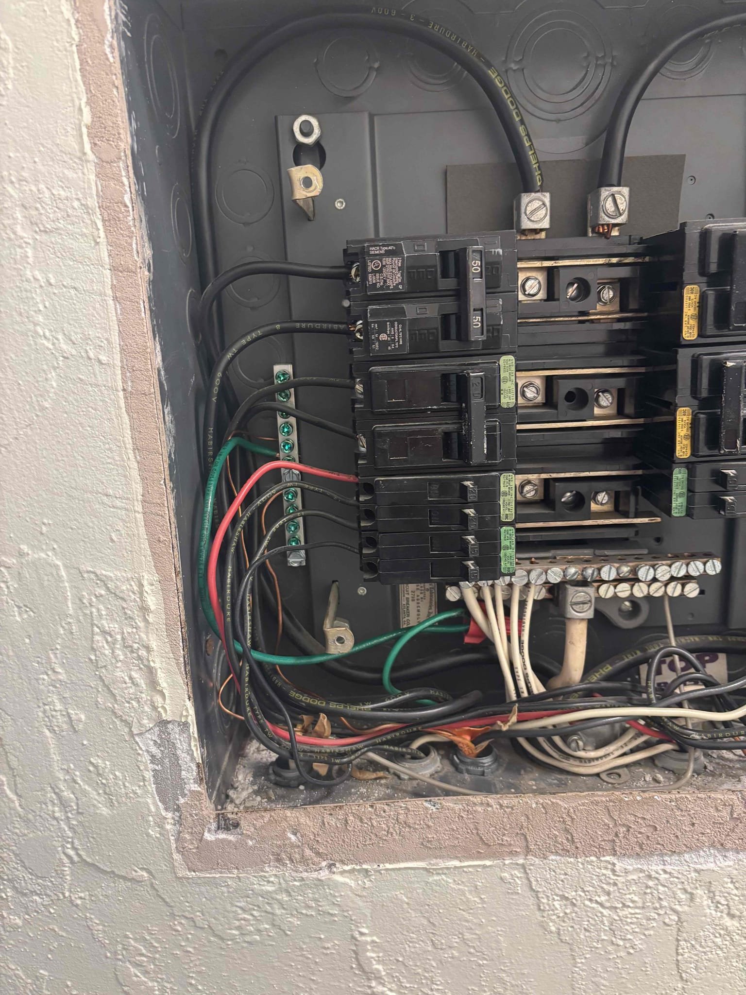 Install ground bar in panel to separate grounds from the neutral bar 
The outlets in the kitchen do not have equipment grounds 
Installed no equipment grounds stickers on GFCI receptacle 