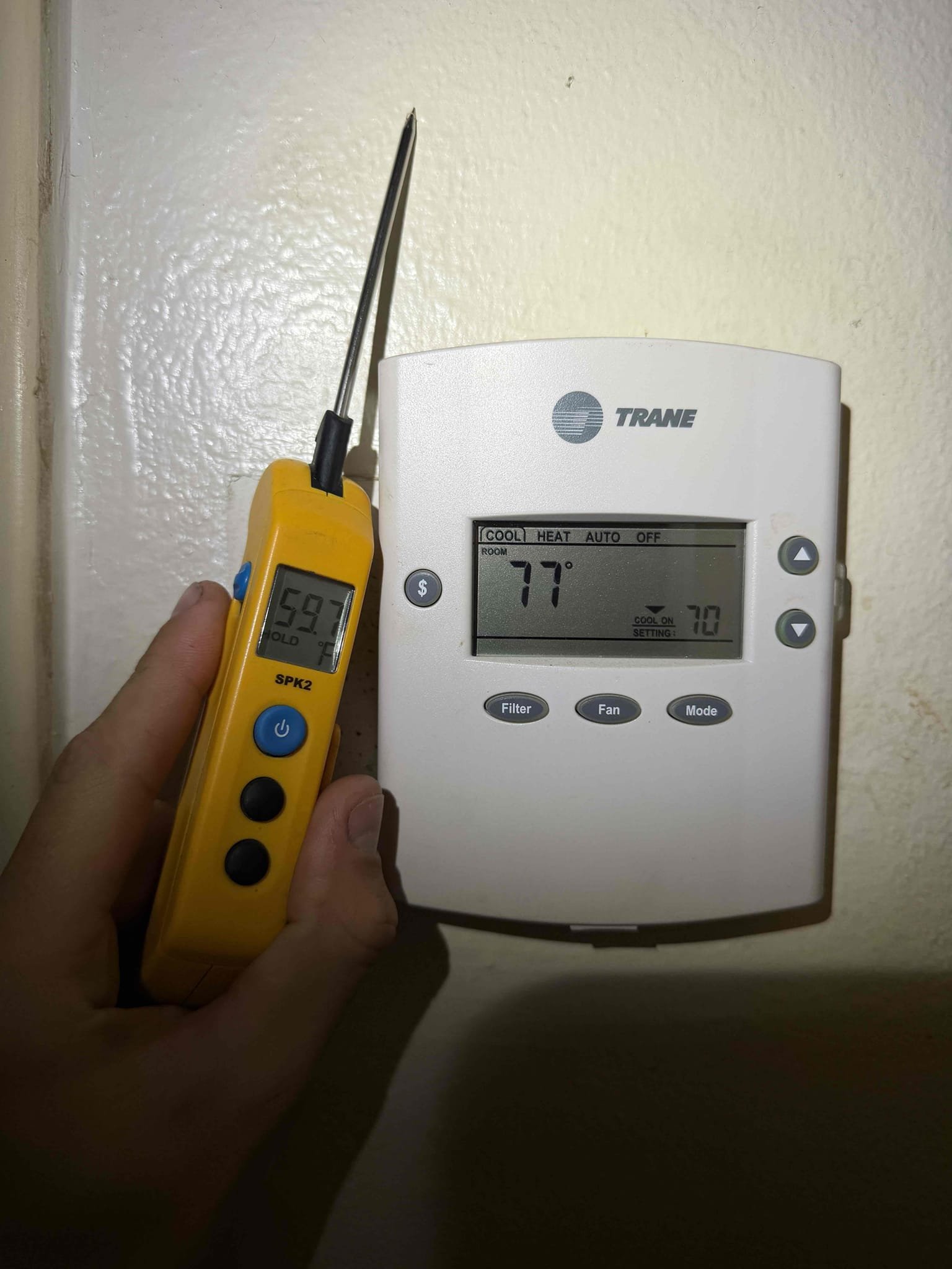 Upon my inspection, found the heat sequencer is constantly closed, even when no low-voltage is applied to it. A new heat sequence is required. Also found fan control board is faulty and causing the fan motor to constantly run. The blower wheel is completely impacted with growth and requires cleaning. Fan motor at this time is over camping at 1.84 with a max rating of 1.59. The capacitor for the fan motor is also weak at this time and requires replacement. The outdoor condenser capacitor is also weak and requires replacement. The contactor at the condenser is pitted. 
Compressor has severe rusting at the suction line connection. 
Quote sent for repairs. 
System cooled with a 18° split with heating disconnected. 