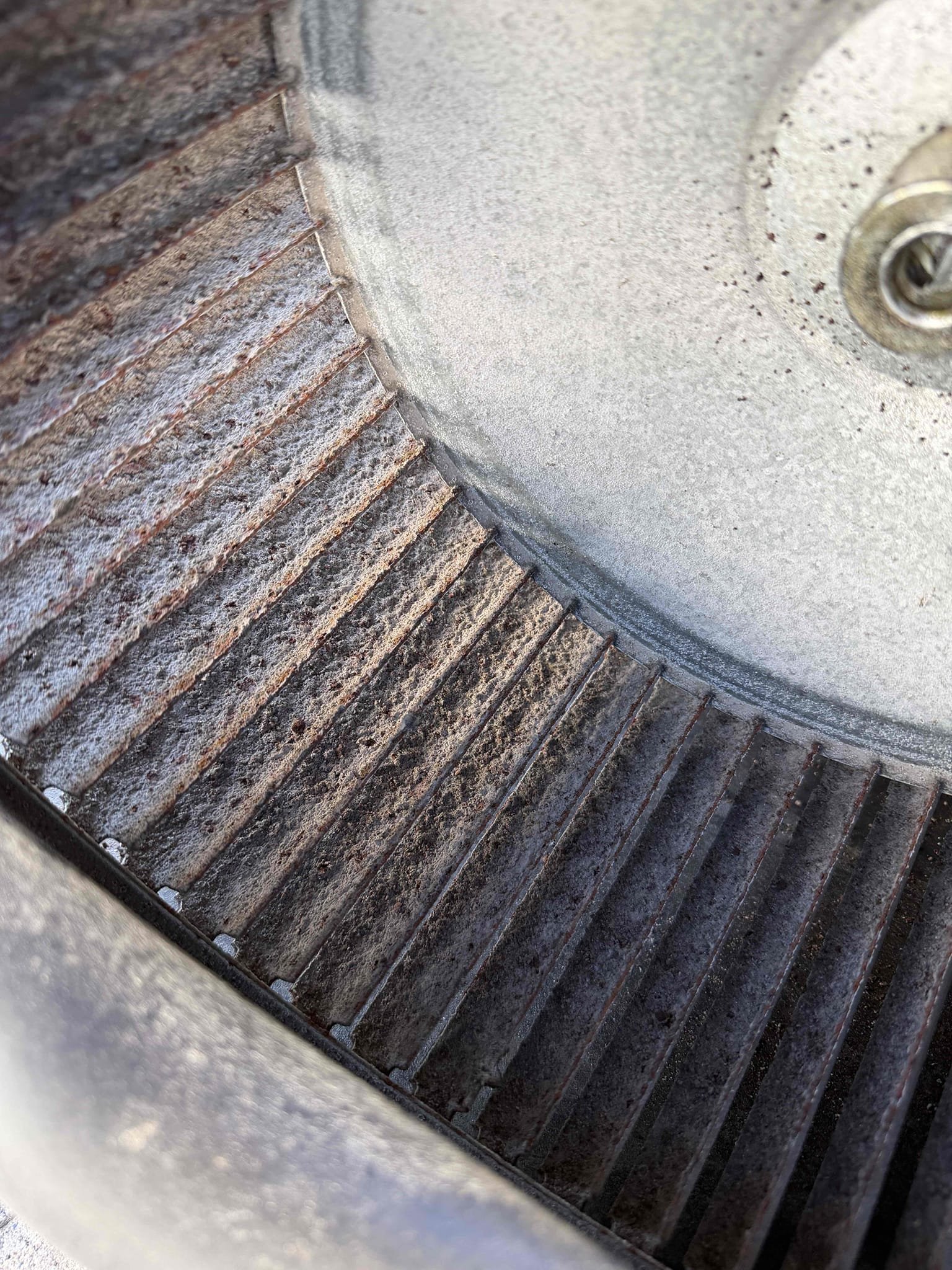 Upon my inspection, found faulty blower motor in the air handler. Picked up part and returned to replace. While blower wheel and housing was disconnected, I performed a complimentary cleaning to remove debris and bacterial growth.  Fixed low-voltage wiring connections at the condenser as a complementary service. These wires were very corroded from the Saltwater. System is cooling at this time. 72° at thermostat and 55° at the supply 
Replace AHU blower motor. 
Cleaned blower housing and wheel. 
Fix outdoor low voltage connections. 