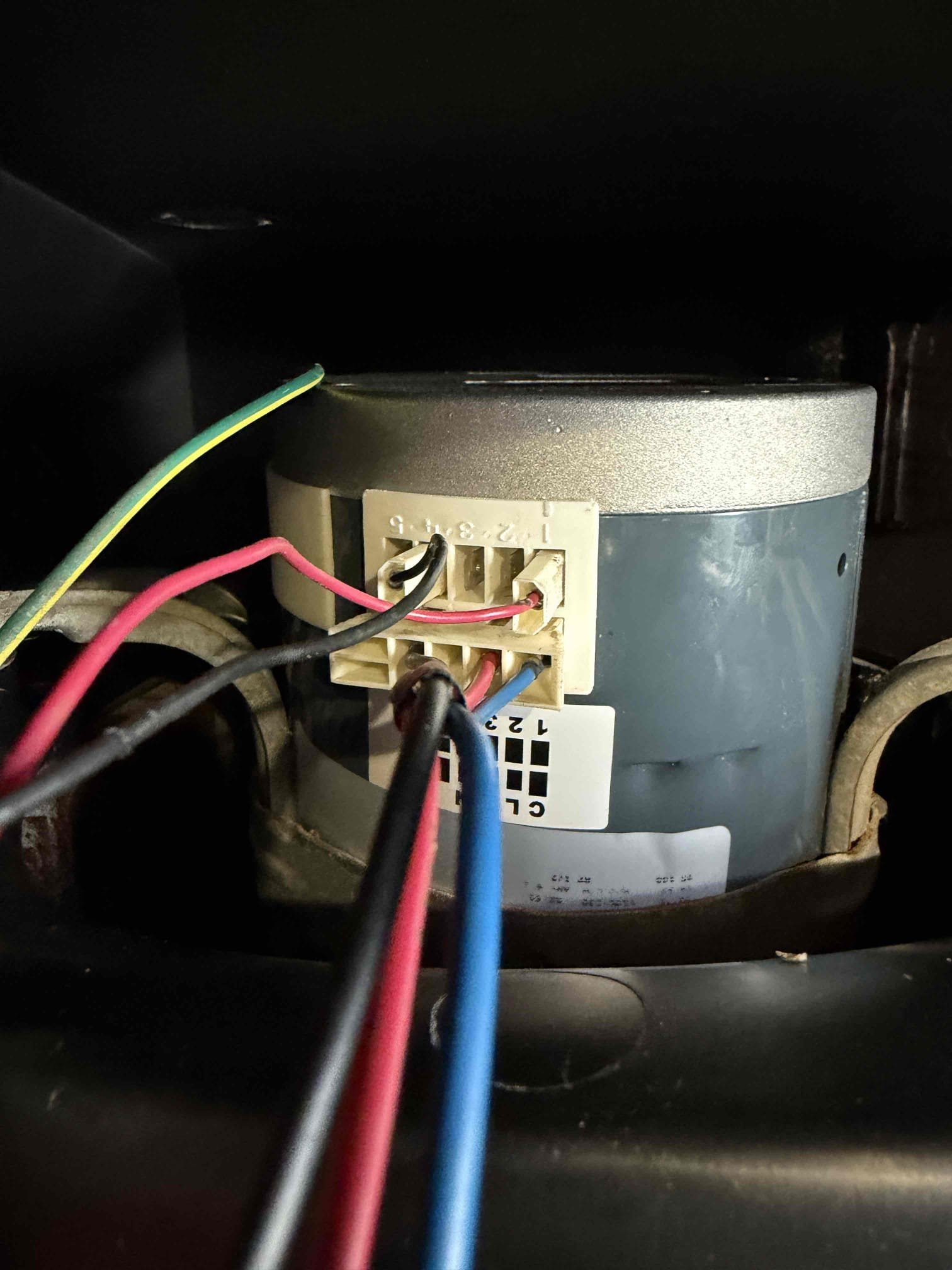 Upon my inspection, found faulty blower motor in the air handler. Picked up part and returned to replace. While blower wheel and housing was disconnected, I performed a complimentary cleaning to remove debris and bacterial growth.  Fixed low-voltage wiring connections at the condenser as a complementary service. These wires were very corroded from the Saltwater. System is cooling at this time. 72° at thermostat and 55° at the supply 
Replace AHU blower motor. 
Cleaned blower housing and wheel. 
Fix outdoor low voltage connections. 