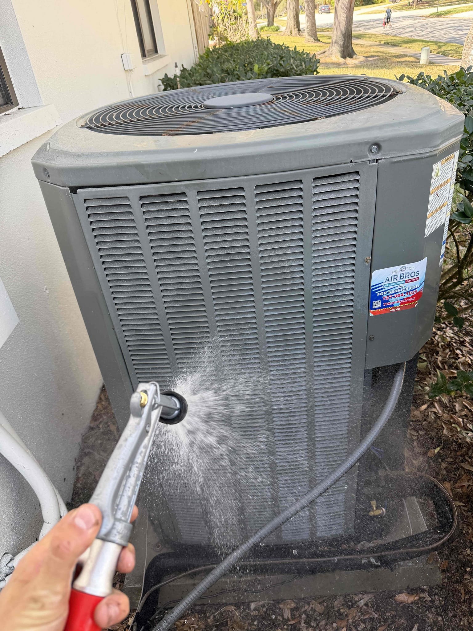 Upon my inspection, found condenser #2 breaker tripped. All wires are tight. Client said there have been many power outages in the area. Recommended replacing the breaker and installing surge protection. 

Performed Maitenences on systems. Cleaned/treated drain lines and primary drain pans. Cleaned condenser coils. Evaporator coils are clean. Verified safety float switchs functionality. Checked amp draw on compressors. Checked amp draw on fan motors. Checked capacitors are within factory range. Made sure all connections are tight. Systems are cooling with 20° temperature splits at this time. Verified systems heat properly. 
After installing surge protectors and new breaker, system run properly. Waited 15 minutes to test breaker and breaker did not trip. 

Scope of work:
- Install two surge protectors on condenser unit disconnects
- Install new 20 amp breaker for condenser #2