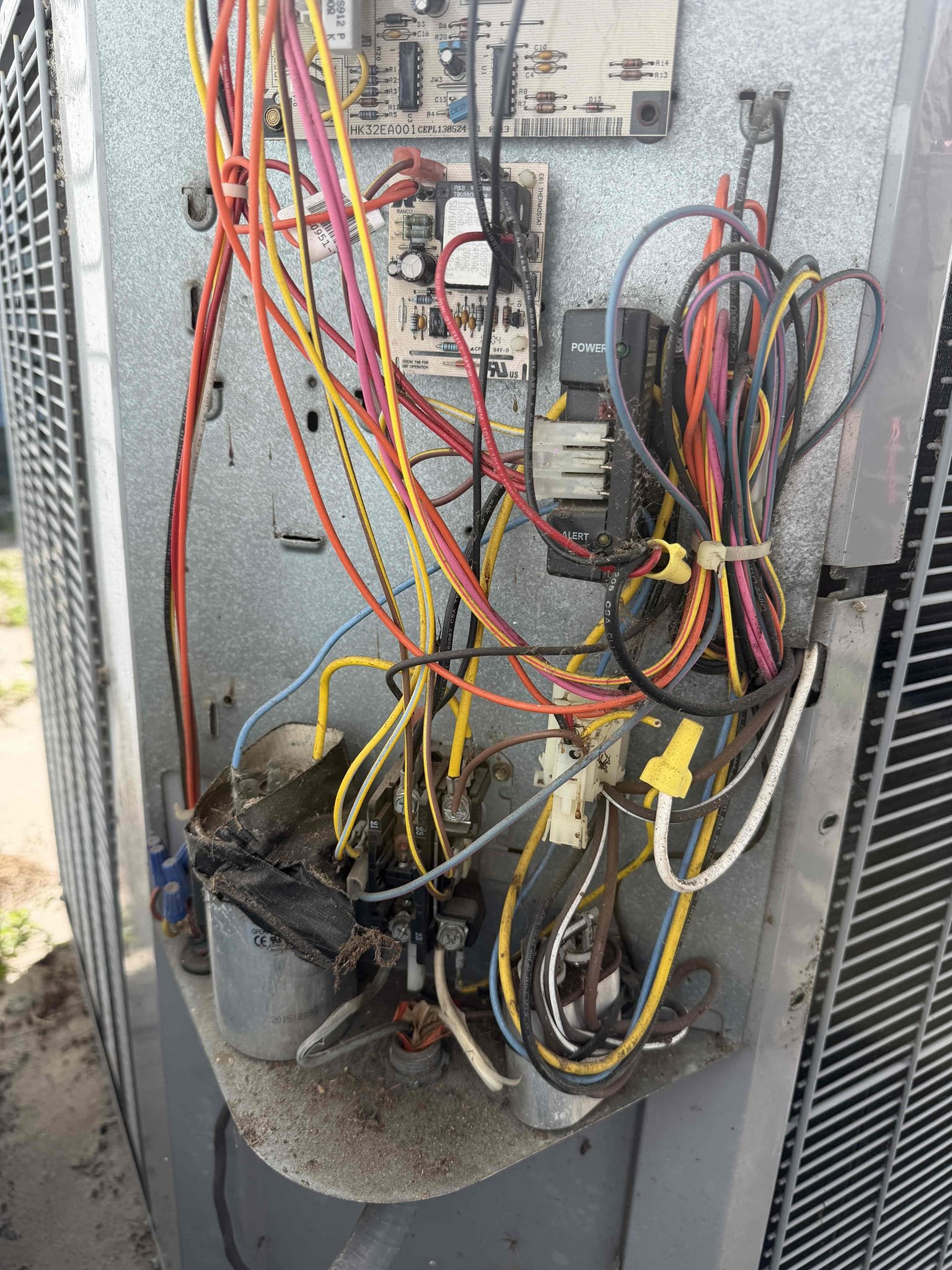 Upon my inspection, found a severely clogged drain line and secondary safety pin was full of water. This tripped the safety float switch and the thermostat turned off. Cleaned and treated drain line and primary drain pan as well as emptying out the secondary safety pan. Check the system and cooling and heating. System is heating properly at this time. Amp draws on the compressor and fan motor are good. Evaporator coils are slightly dirty. The capacitor for the compressor is out of its factory tolerance limit. The fan motor capacitor is barely out of its tolerance limit. Found low voltage wiring at the condenser showing bare copper and at risk of shorting out the fuse. 
Made all necessary repairs besides the fan motor capacitor. 

Despite unit age and condition, client does not want to move forward with a new system before selling the house in the summer. 