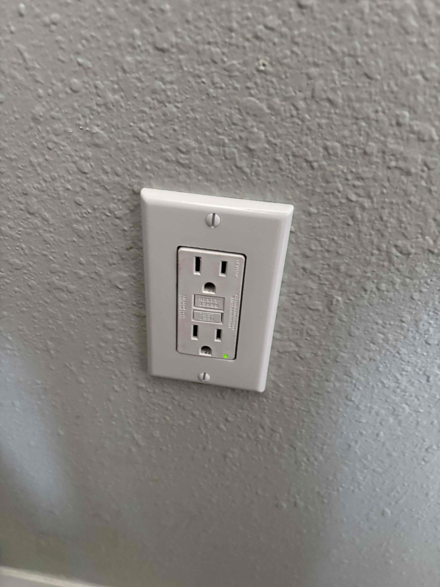 Replace the 2 older GFCI outlets in the living room that feed the kitchen outlets

Rework the refrigerator circuit into a box in the wall to protect the wires properly 