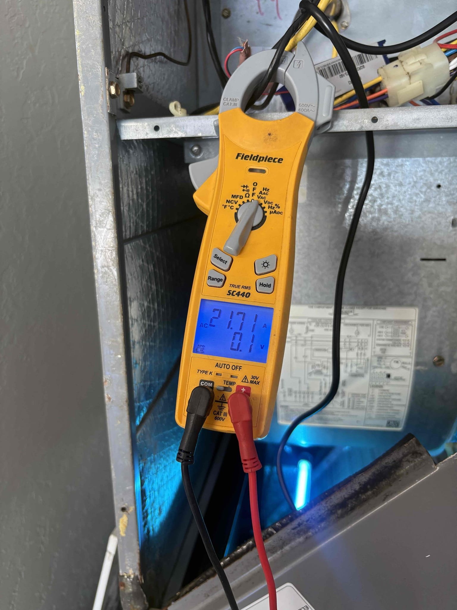 Upon arrival home owner states downstairs unit outside was short cycling and not cooling properly. Found compressor over heated. Cooled down compressor for further diagnosis. Found heater kit running same time as cooling. White wire from air handler to outdoor unit shorted. Swapped wires and heater kit turned off. Verified system is operating. 

Potential outdoor board issue cussing system to cycle. Explained we can not guarantee how long compressor will run with the underlying conditions. Verified no water in safety overflow. 

System is currently operating 