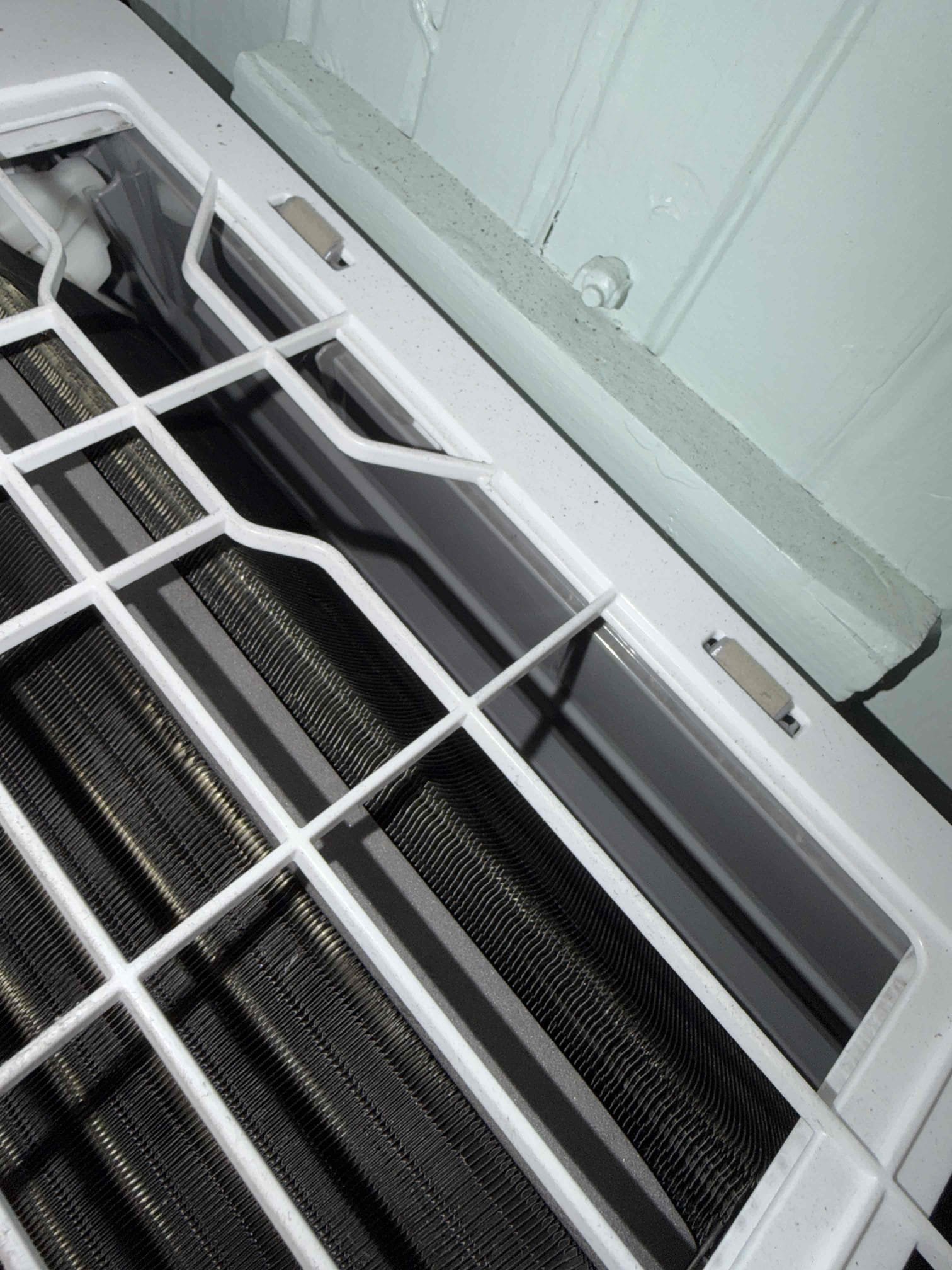 Found system freezing up and low on refrigerant. After performing leak search found leak in evaporator coil. 
Options:
- Replace evaporator coil and new refrigerant. 
- Replace entire system