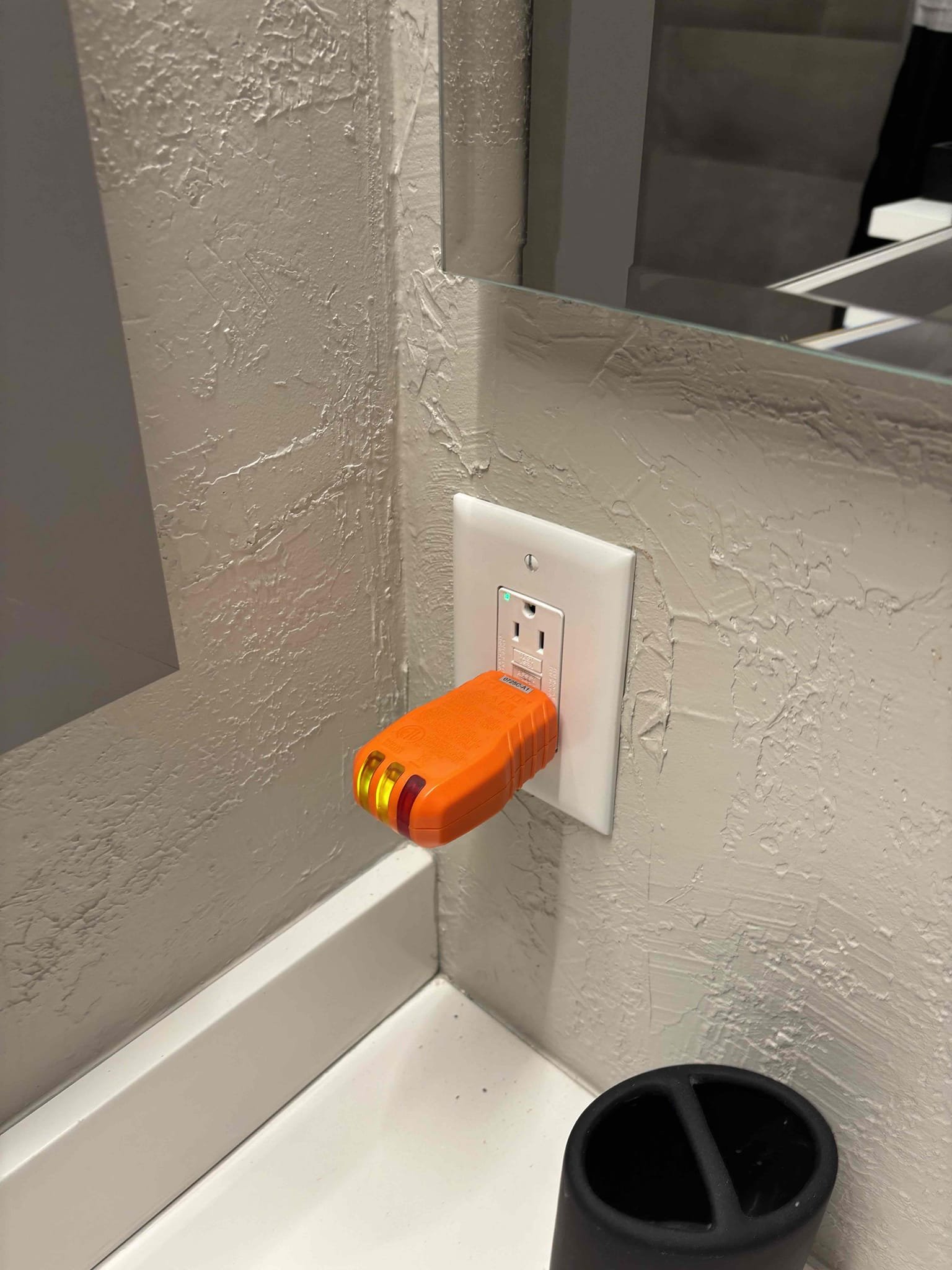 Add a GFCI plug to the bathrooms and kitchen 
Garage outlet on a 2 pole 60 installed a single pole 20 amp and wired the outlet to that breaker 
Open junction box in the attic the cover for the led wafer light was open just had to close it 