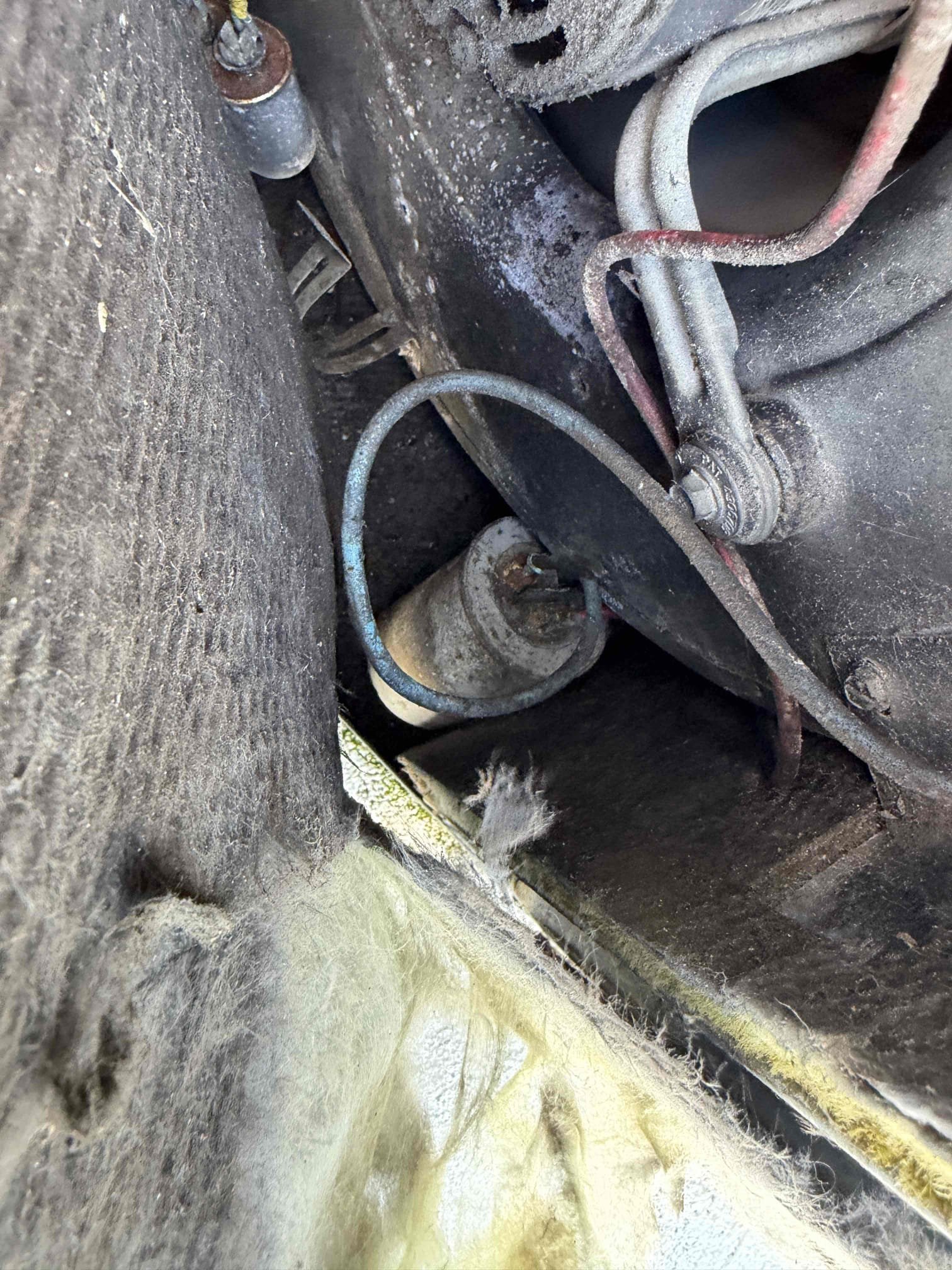 Upon my inspection, found very old package horseshoe unit not cooling efficiently. Found very heavily dirty air filters. Unit is in very bad condition with bare wires and capacitors touching fan blower housings, dirty evaporator coils, bare wires at the condenser fan motor. We are not working on this system due to it s poor condition and age. Only recommendation at this time is to change filters and a new system replacement. 
Left filter out of system until client replaces filter. 