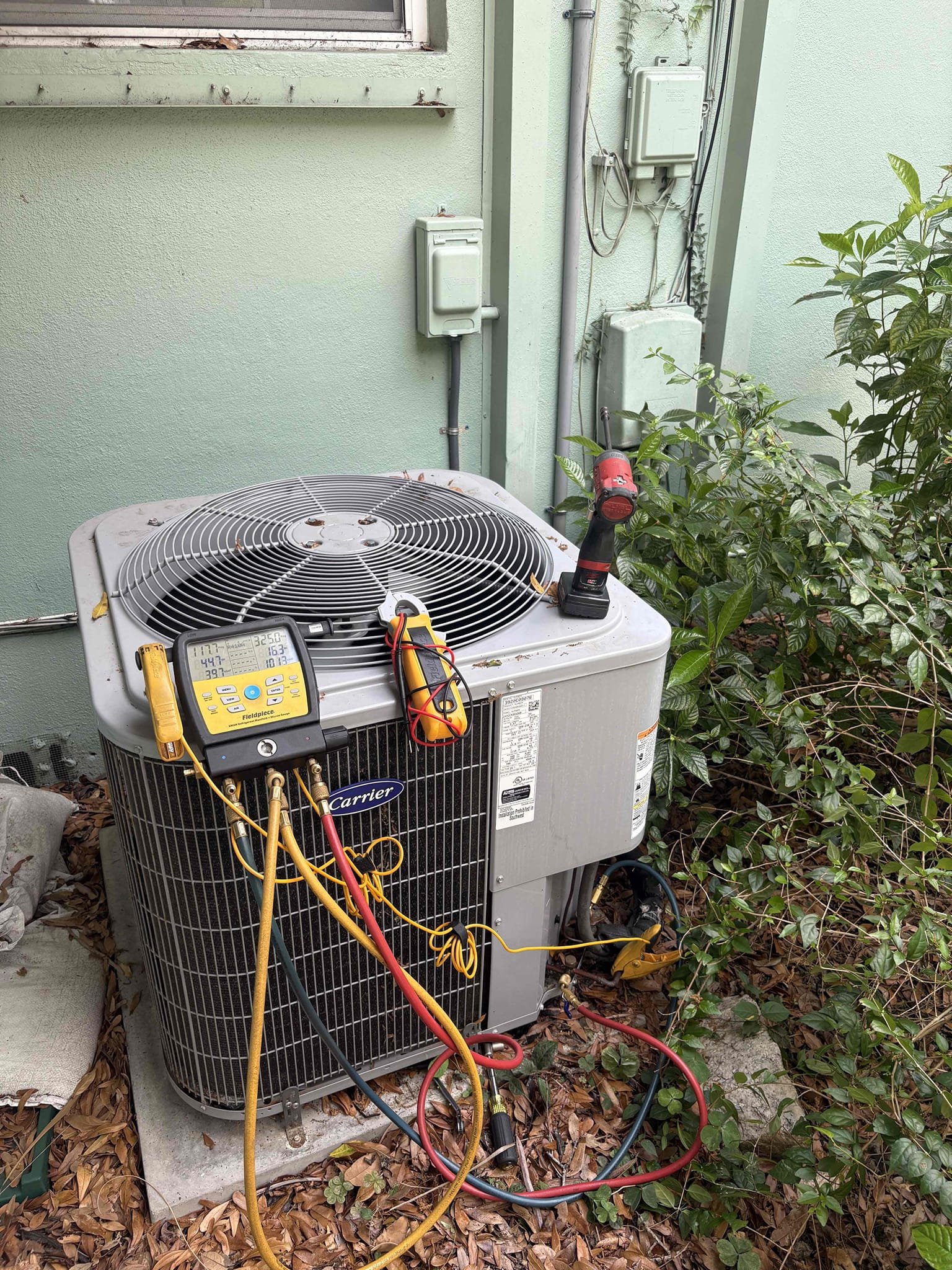 Home owner states outdoor unit making grinding sound. Tested capacitor and starting components. Checked outdoor motor and compressor amps. 

Outdoor components are working within manufacture specifications. Compressor internals are failing. Outdoor coils impacted with debris and affecting pressures. 

Air handler has heavy condensation building up. Secondary pan may go out on safety due to water. Components inside air handler getting wet. Found back side of coils dirty and return smashed. 

Unit is currently out of warranty due to being second home owners. Went over potential repairs and cost. Also wet over options for new system. 

Explained with minimal repairs (new return & cleaning outdoor coils) I can not guarantee how long outdoor compressor will last. 