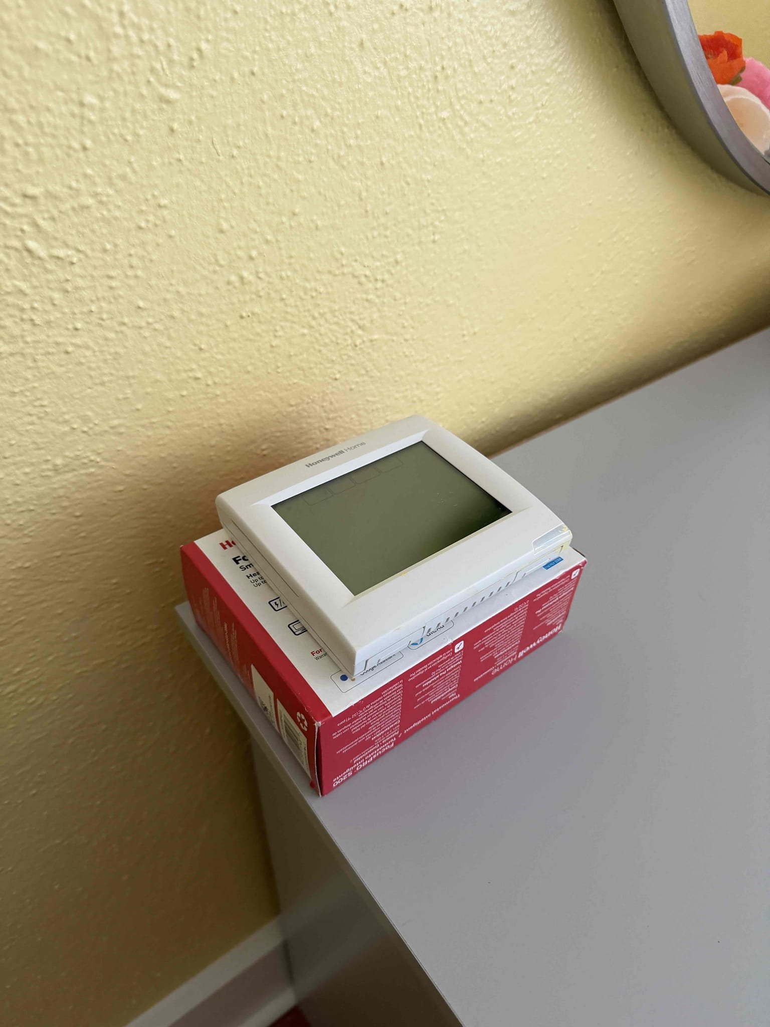 Replaced upstairs thermostat. Programmed and tested functions