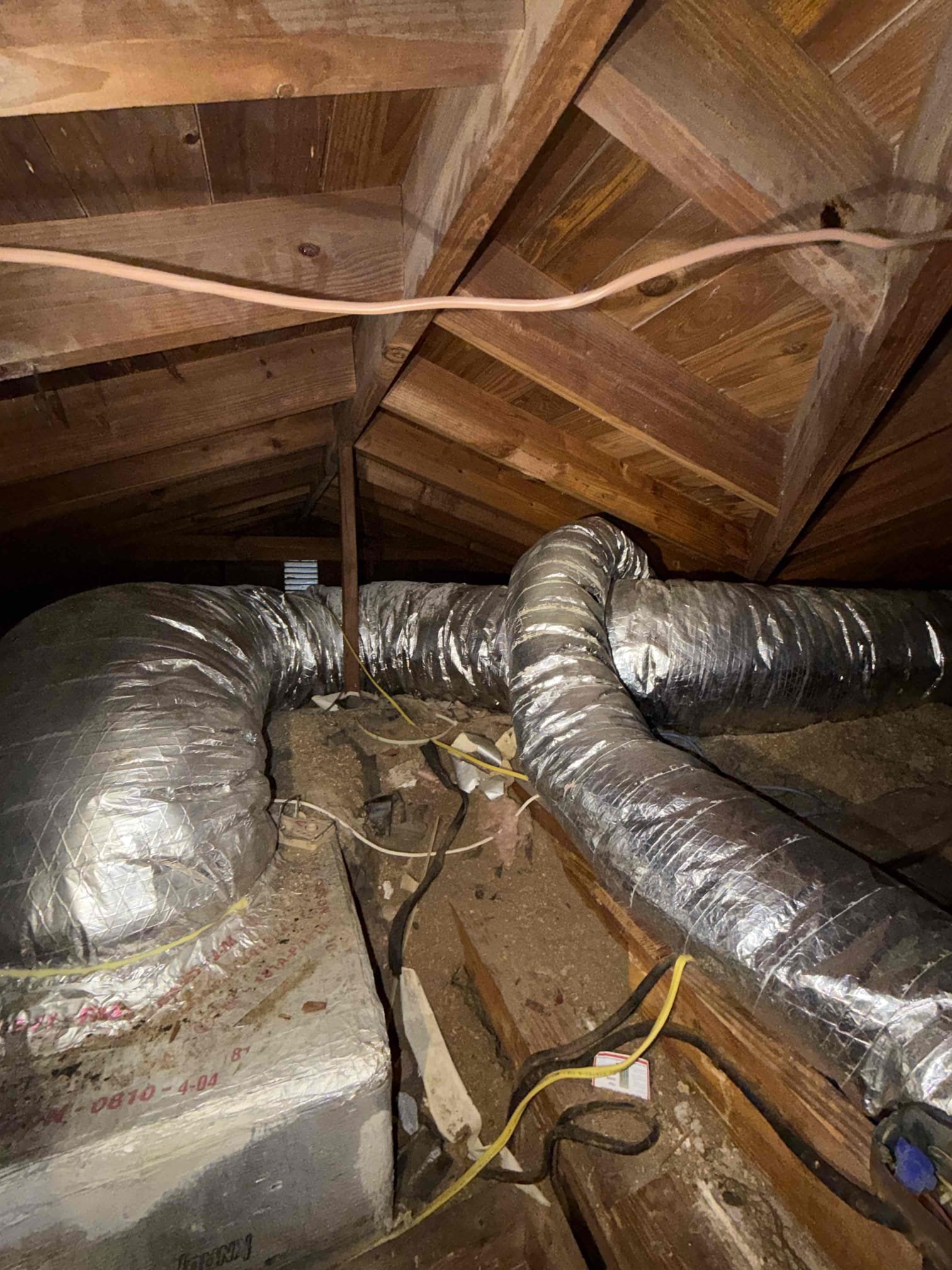 Performed Maitenence on system. Cleaned/treated drain line and primary drain pan. Cleaned condenser coils. Evaporator coils are clean. Verified safety float switch functionality. Checked amp draw on compressor. Checked amp draw on fan motor. Checked capacitor is within factory range. Inspected Contactar. Made sure all connections are tight. System is cooling with a 20° temperature split at this time.

UV light is still working at this time. 
Duct work is not strapped up or sealed properly. Client is not interested in investing at this time due to home renovations. Will revisit this issue next winter. 