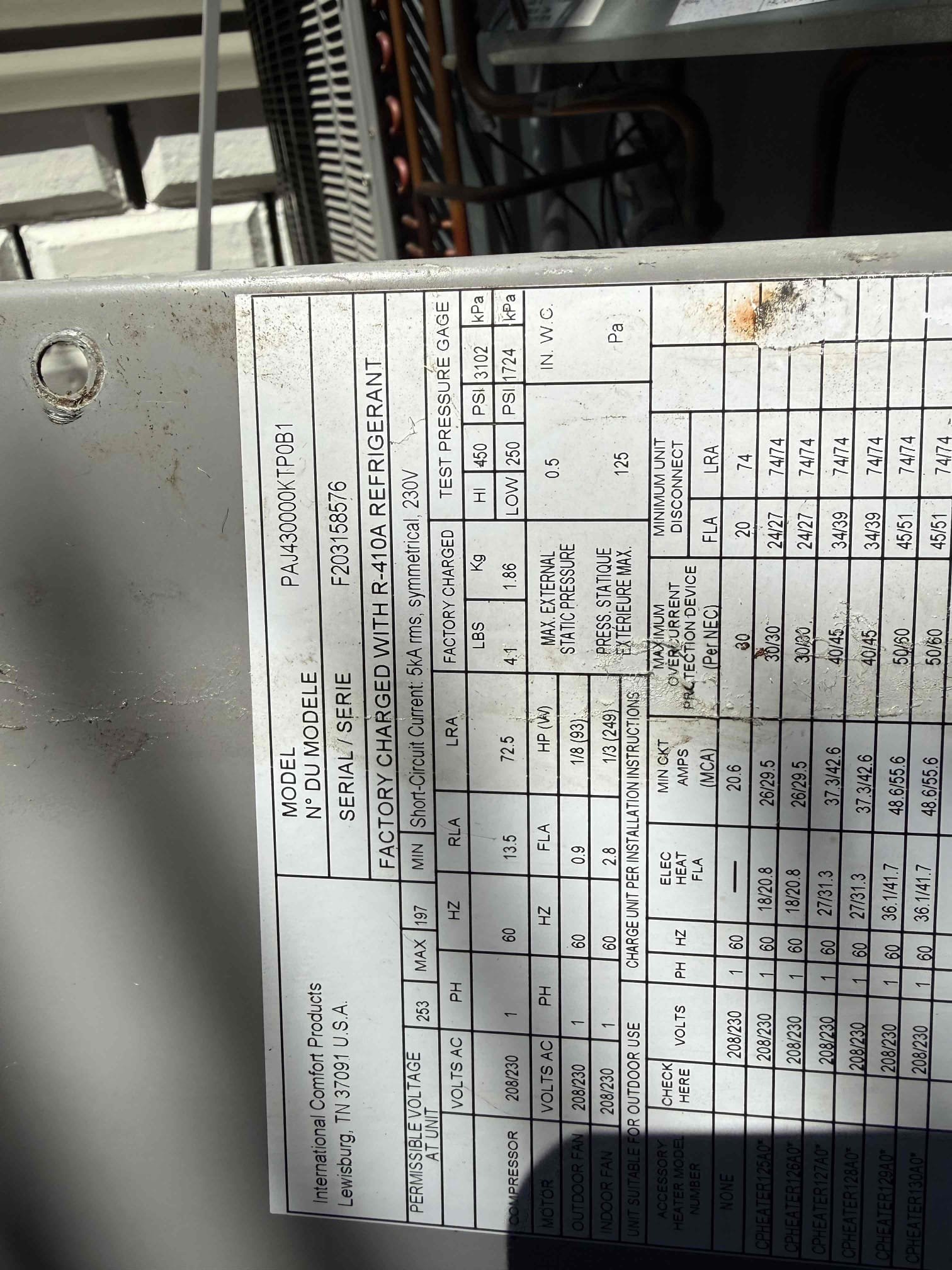On arrival found downstairs unit not cooling due to bad blower motor. Replaced motor. Start and test. Unit is cooling properly. Replaced bad section of thermostat wire for upstairs condenser. 