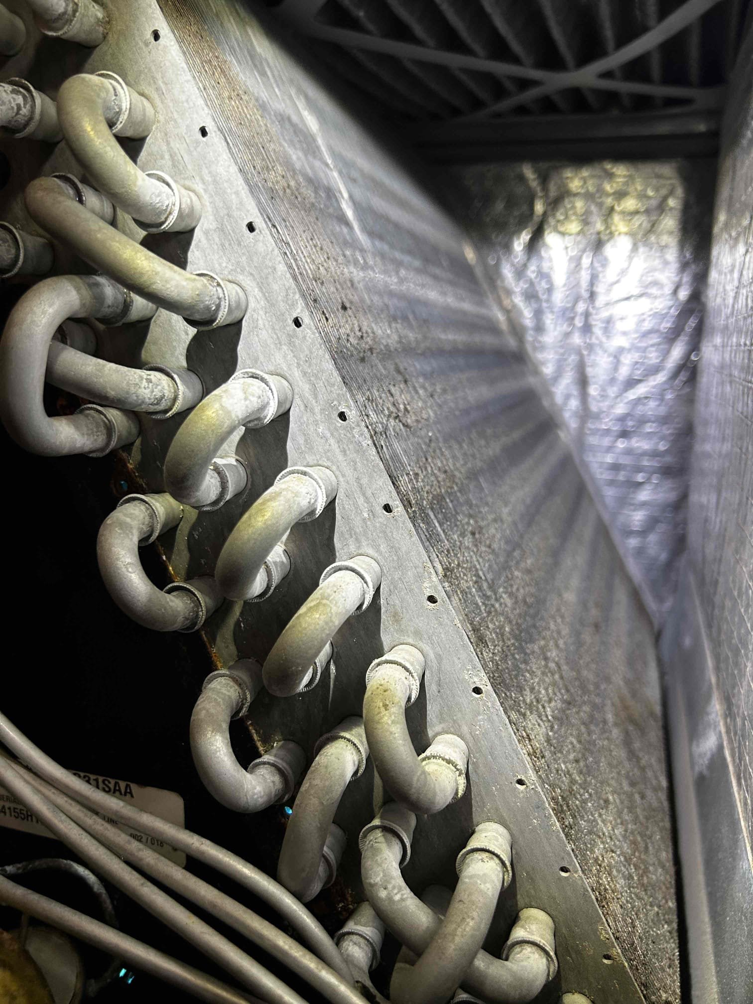 Performed maintenance on 2 systems. Fixed duct connection under home preventing air flow. All ducts blowing properly. Cleared drains. Rinsed condenser coils. Added refrigerant to bring units back to factory specs. Both units are operating properly at this time. 