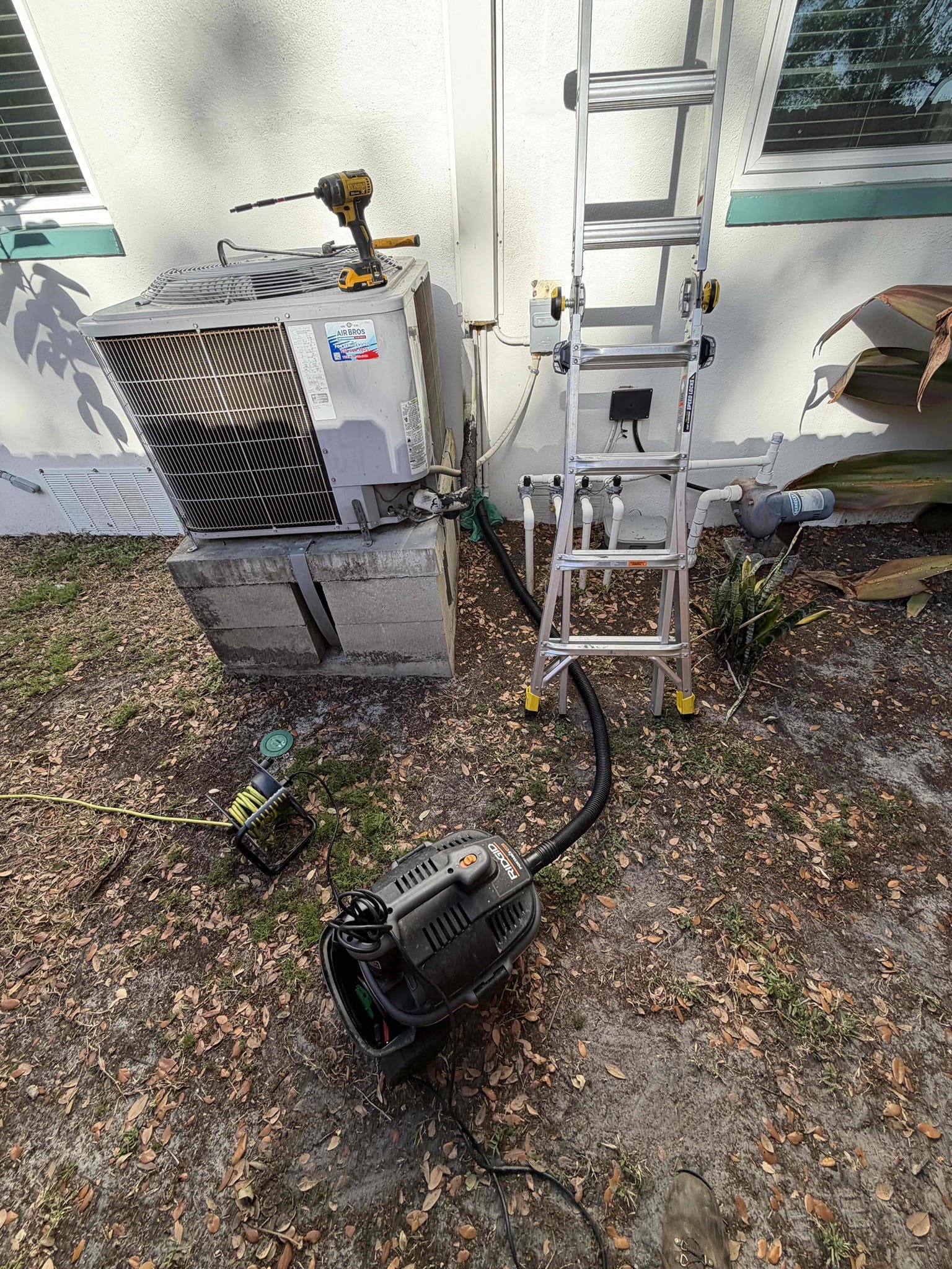 Found extremely clogged drain line with rust debris inside. System is older and evaporator coil may be dropping rust particles causing drain to clog up worse over time. Cleaned drain line with lvl3 method. Drain line did not have a p trap installed. Installed a new p trap and verified system is now draining properly. Advised client to call us asap without touching the system or vacuuming water so that we can accurately diagnose any issues at hand as they happened. 
System is cooling and draining at this time. 