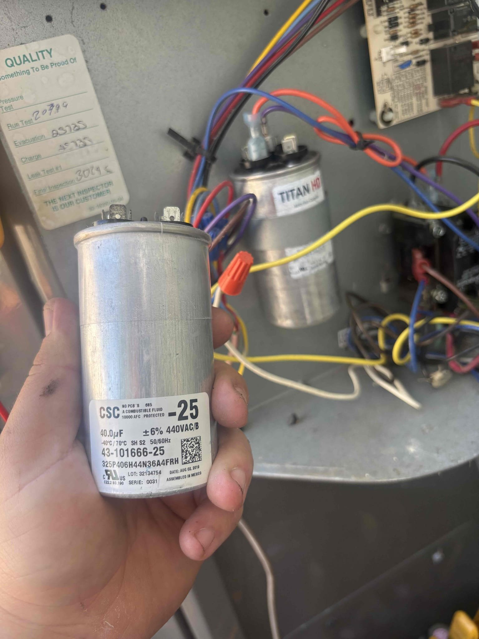 System not cooling due to low on refrigerant, indicating leak in system. Also found outdoor capacitor reading weak. Went over repair options and potential future repairs. Replaced outdoor capacitor and performed leak search. Found leak in outdoor coil. Will need to call manufacture for warranty and availability. Added refrigerant for temporary cooling. 