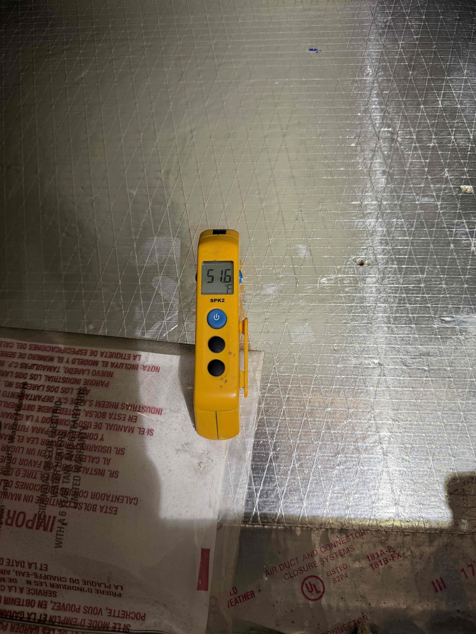 Upon my inspection, found severely clogged drain line. Also found safety float switch was on wrong side of the p trap which was not allowing for power to be cut to the system and turn it off before flooding the floor. 
Removed full drain line and replaced with new. Installed existing safety float switch on proper side of the p trap. Installed a clean out port so that the client can pour their vinegar down the drain if they would like to. 
Tested drainage. System is cooling and draining properly at this time. 