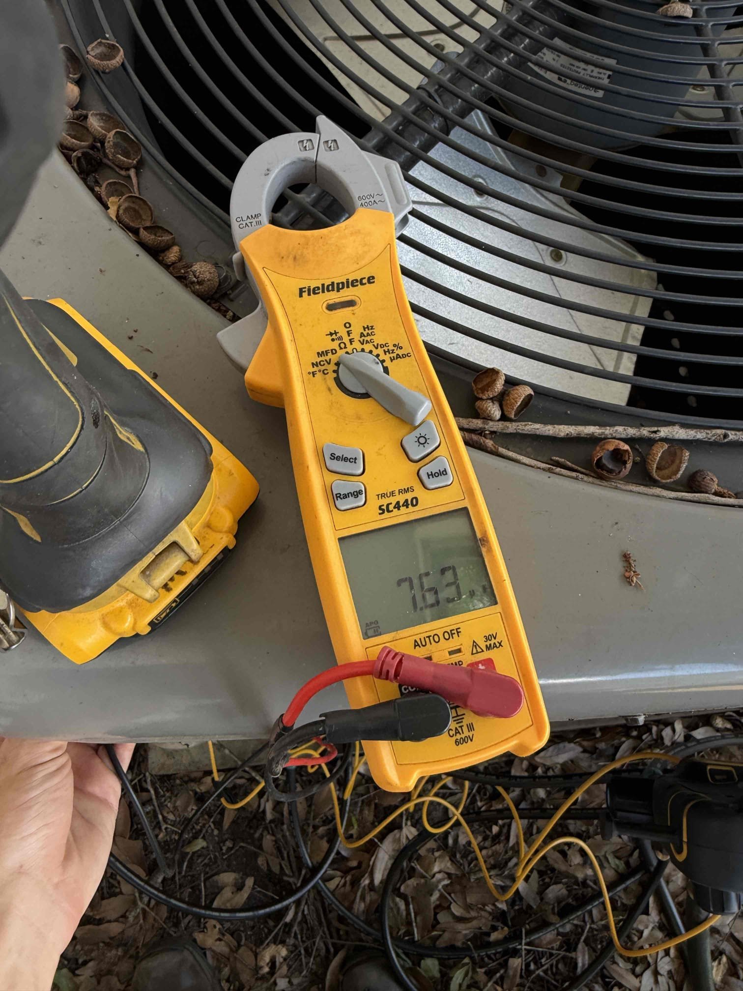 Upon my inspection, found severely clogged drain that was tripping the safety float switch. Also found evaporator coils are severely clogged, condenser coils dirty, and bare wires at the condenser disconnect causing the breaker to trip. 
Performed drain cleaning, removed faulty wires from disconnect, cleaned condenser coils, and performed Maitenence on system for first membership Maitenence. 
Capacitor is within factory range. Compressor amps are good. Fan motor amps were over its max rating due to dirty condenser coils. 

Client is aware of the severity of the evaporator coils and will schedule as soon as he is ready. 
System is cooling at this time with a 19° temp split. 

When we return to clean evaporator coils, we will re route the lineset connections and pvc connection to allow for filters to be installed directly underneath the coils. 