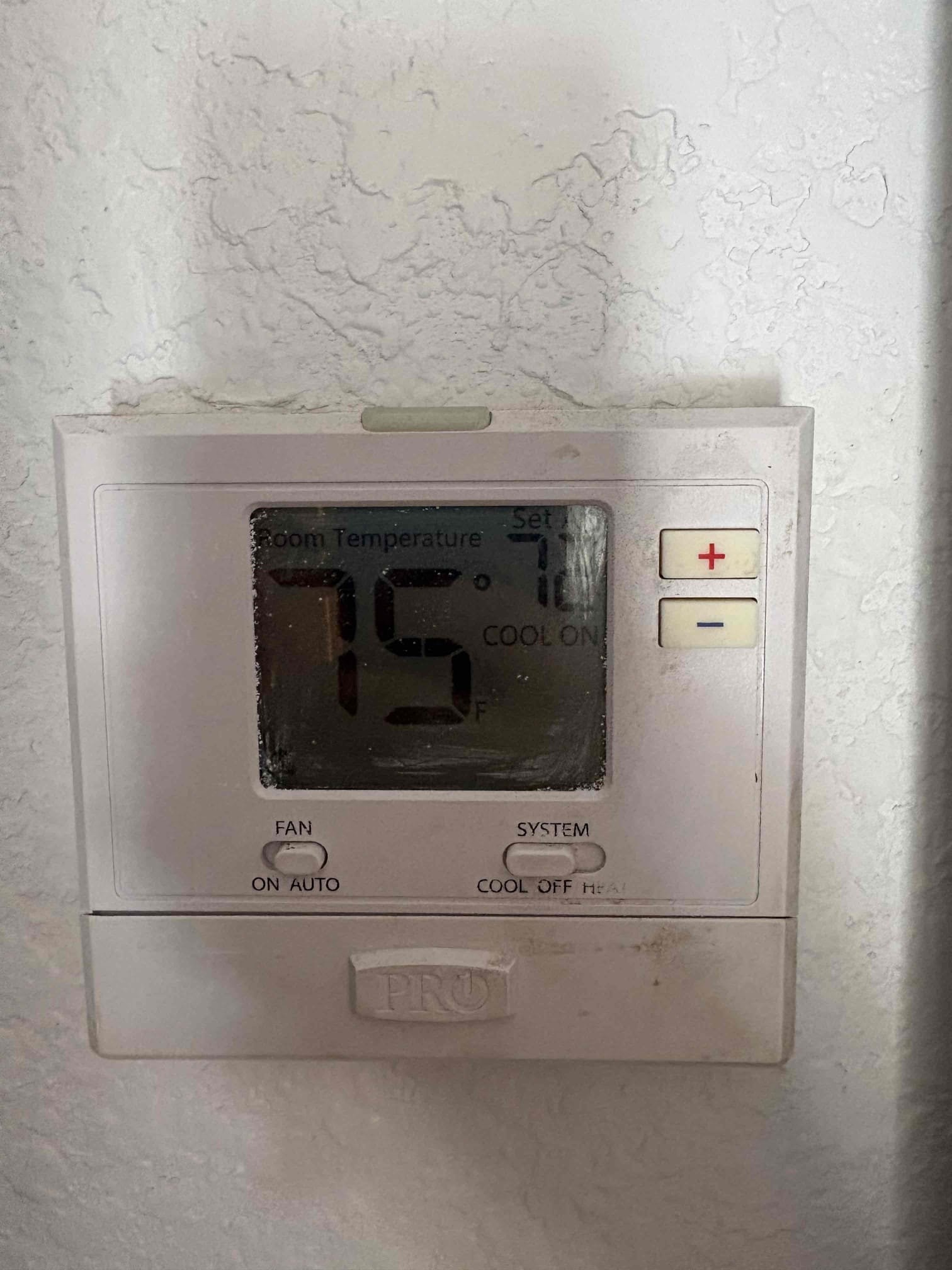 Unit is currently cooling. System is non matching. 4T oversized system for 1,000sf. System does not look to be permitted. Other company came out and charged system. Potentially a leak. Recommend replacing system with proper size/match up and permits. 