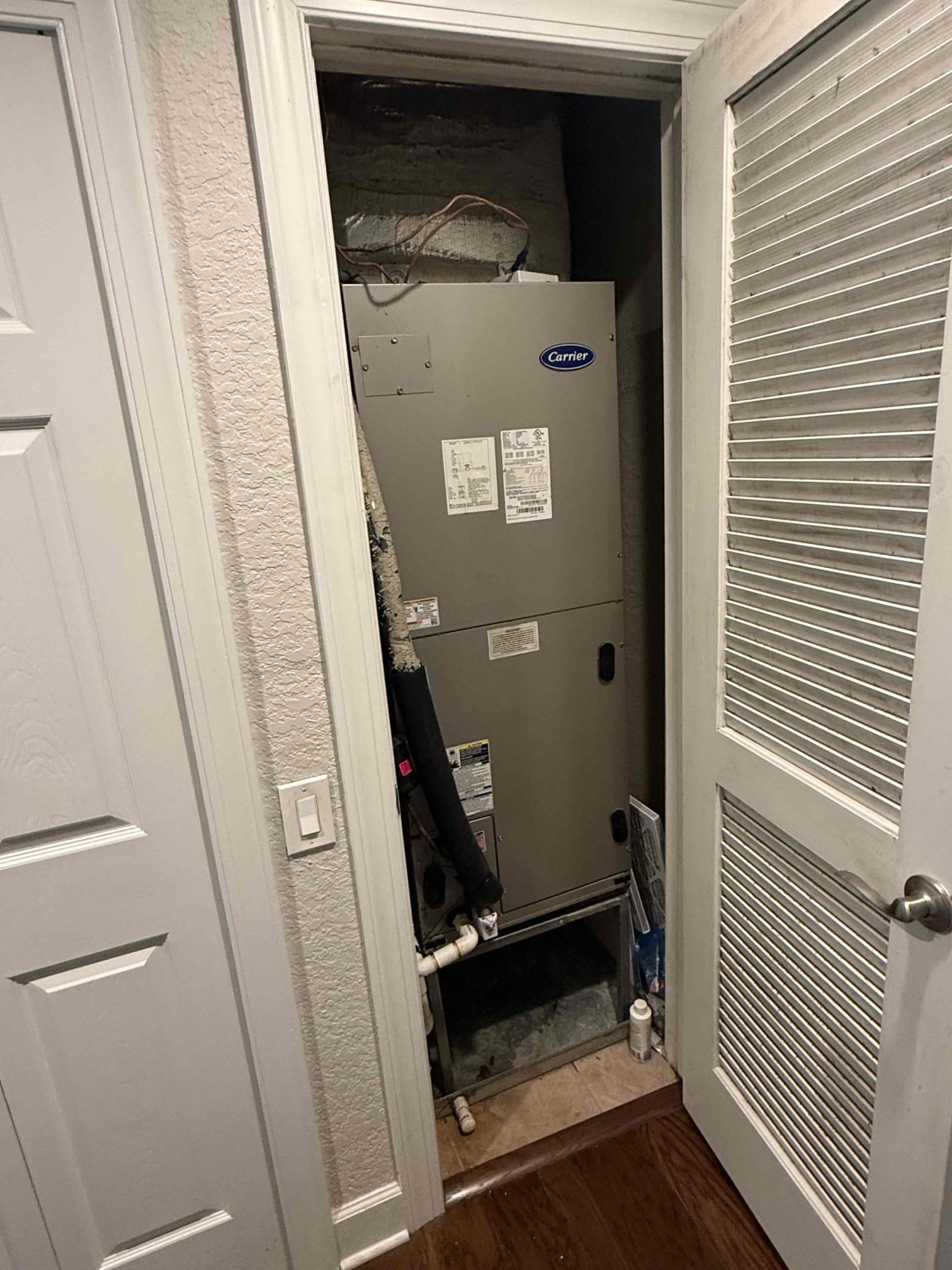 On arrival found evap coil to have ice build up. Found blower motor intermittently shutting off causing unit to freeze. Recommend to replace motor to prevent further issues. Added secondary float to help prevent water damage. Unit cooling. We do not advise client to invest into motor replacement due to age. Made client aware anything can break at any time. Unit is out of warranty and could be costly to keep repairing unit. 