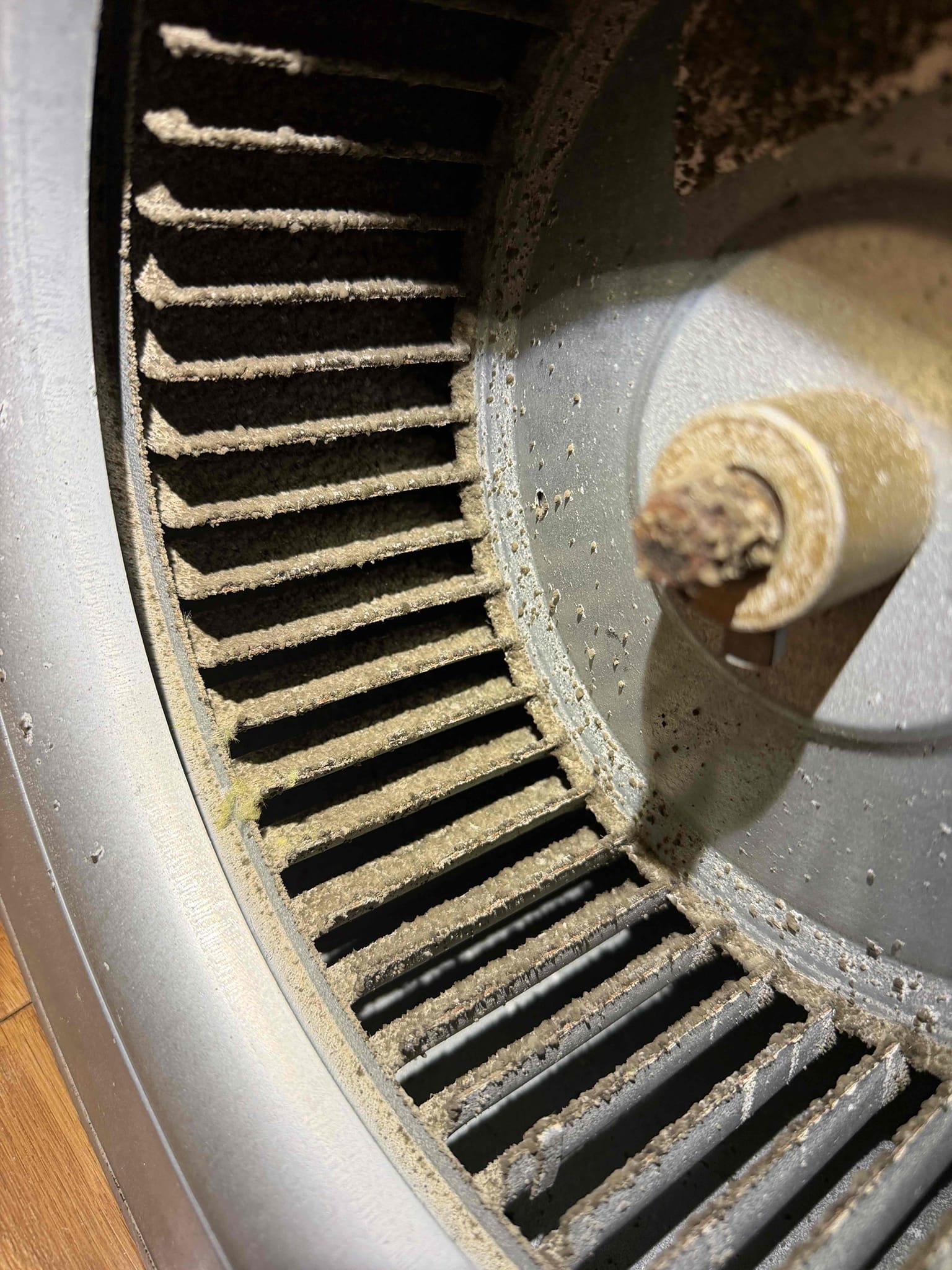 Pull and clean blower. 