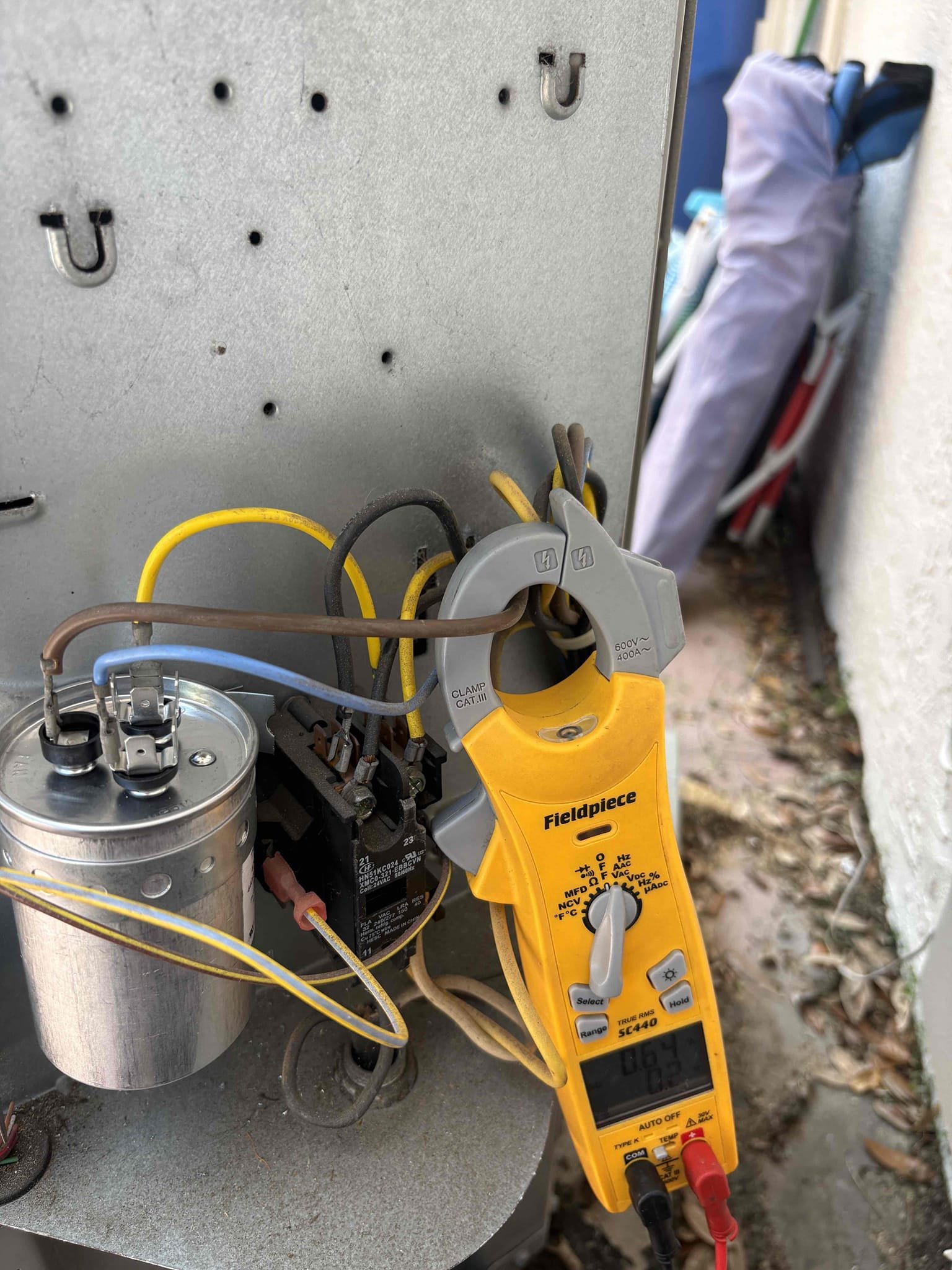 Replaced failed capacitor and flushed drain line 

Air handler coils impacted with debris 

System out of warranty

Went over current issues with system and options for future replacement 

Verified system operations 
