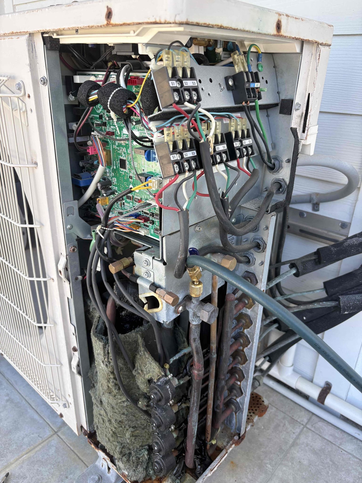 Upon arrival home owner states upstairs system is not cooling. Found system low on refrigerant indicating leak. Explained we would need to come back for extended leak search. 4 cassette heads to one outdoor condenser. Charged system back to factory specs. Explained if leak is in our work we will cover and refund refrigerant back. 