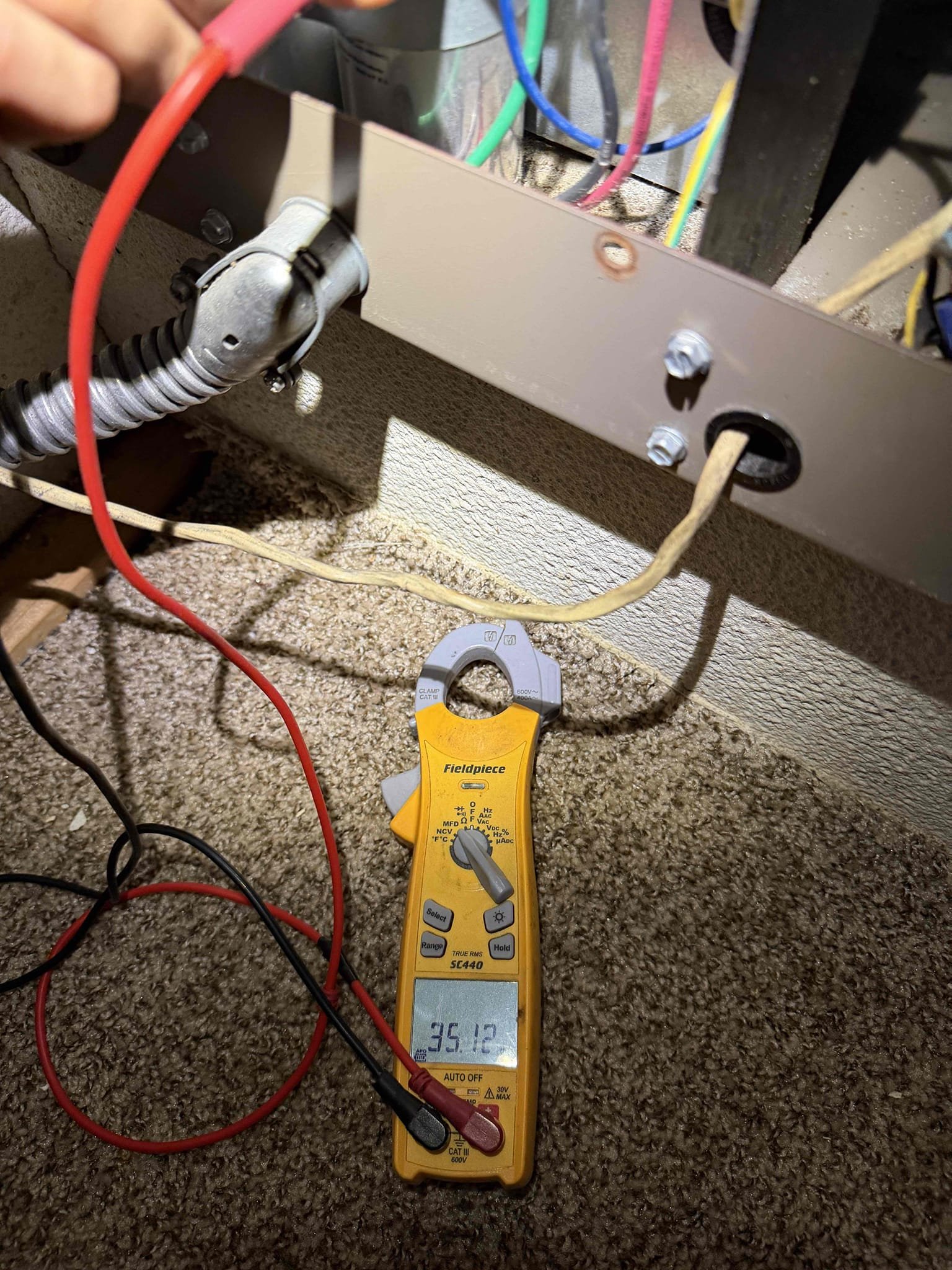 Upon my inspection, found safety float switch tripped. Performed a drain cleaning and treatment on the drain line and primary drain pan. Performed full maintenance on system for first time. Capacitor and contactor are good. Amp draws are good. Temperature split is good. Drain line is now clean and treated. System is cooling at this time.