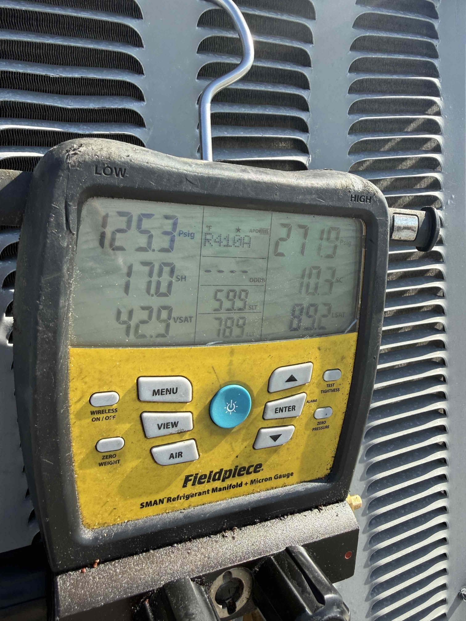 Performed main 1 system. Added 2” metal strap to secure condenser. Cleared pan and drain. Added chemical to help prevent growth. Replaced weak cap under warranty. Unit cooling properly. 