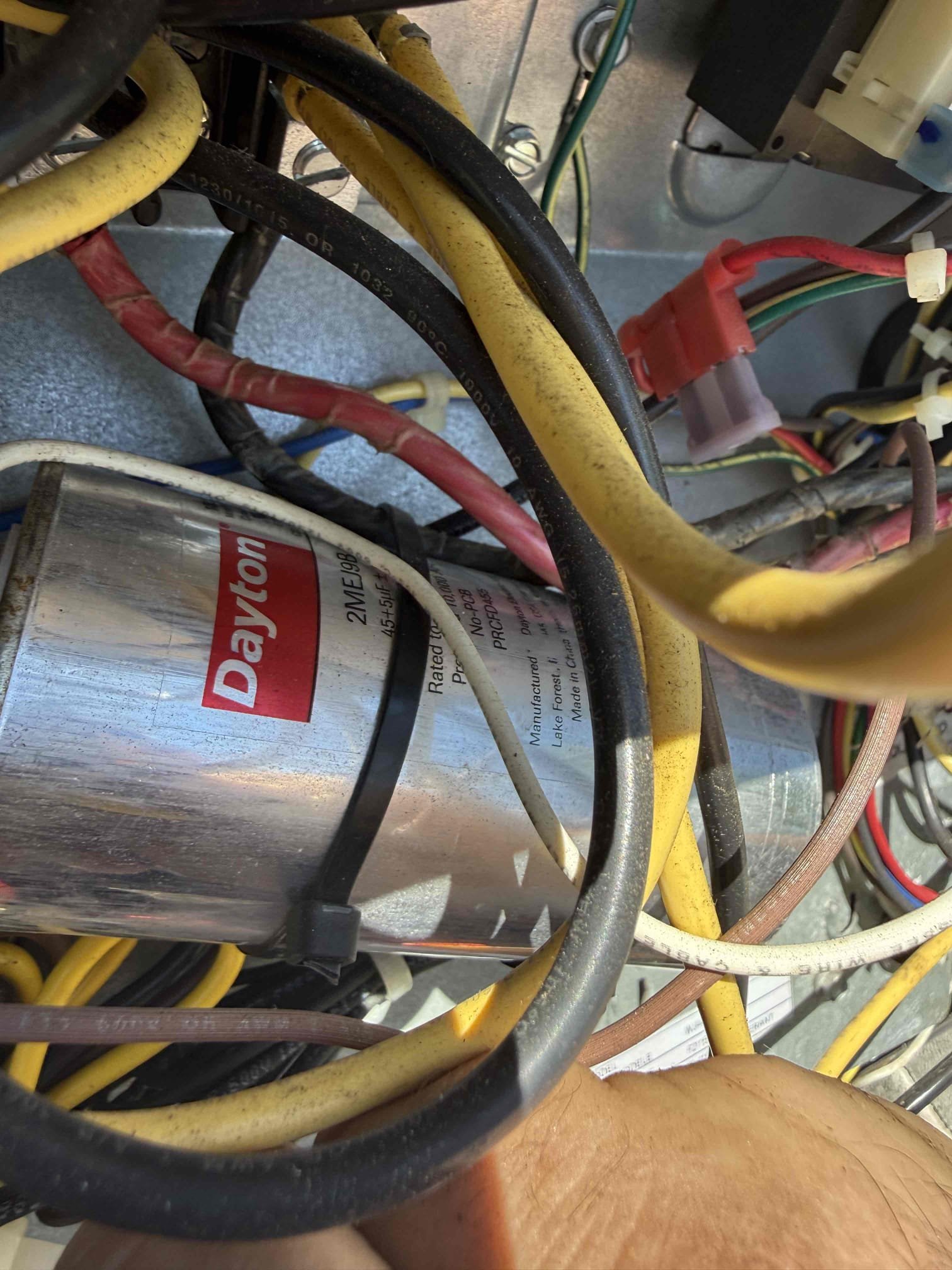 Performed maintenance on one system. Cleared pan and drain. Added chemical to help prevent growth. Pressures good. Temp split good. Rinsed outdoor coils. Indoor blower and coil clean. Found weak capacitor on system and high voltage whip from disconnect has no seal tight to protect from elements. Recommend to replace capacitor and add seal tight. Unit cooling at this time. 