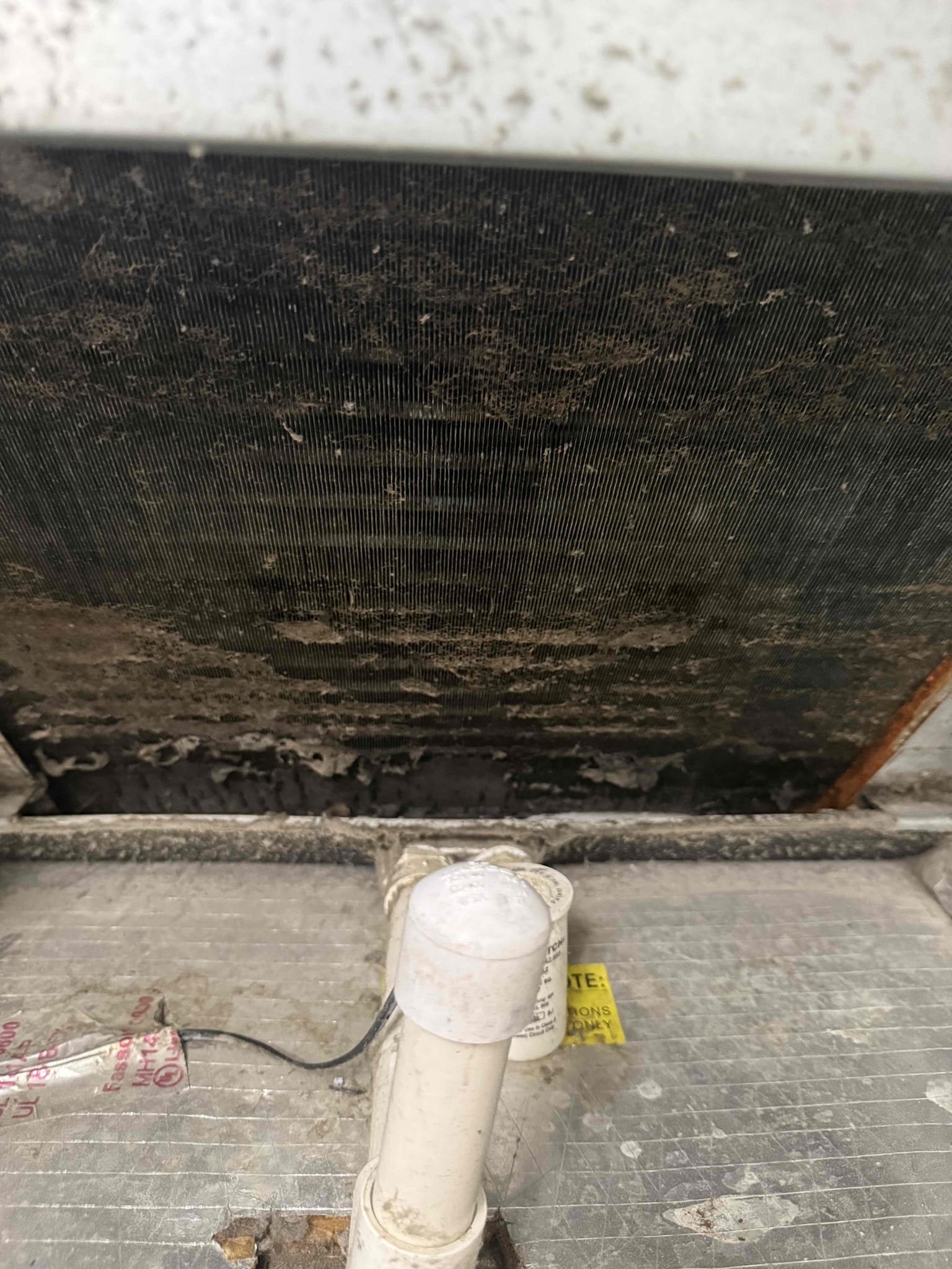 On arrival found unit not cooling due to weak capacitor. Replaced part. Start and test. Cleaned in place evap coil. Cleared drain. Unit cooling at his time. 