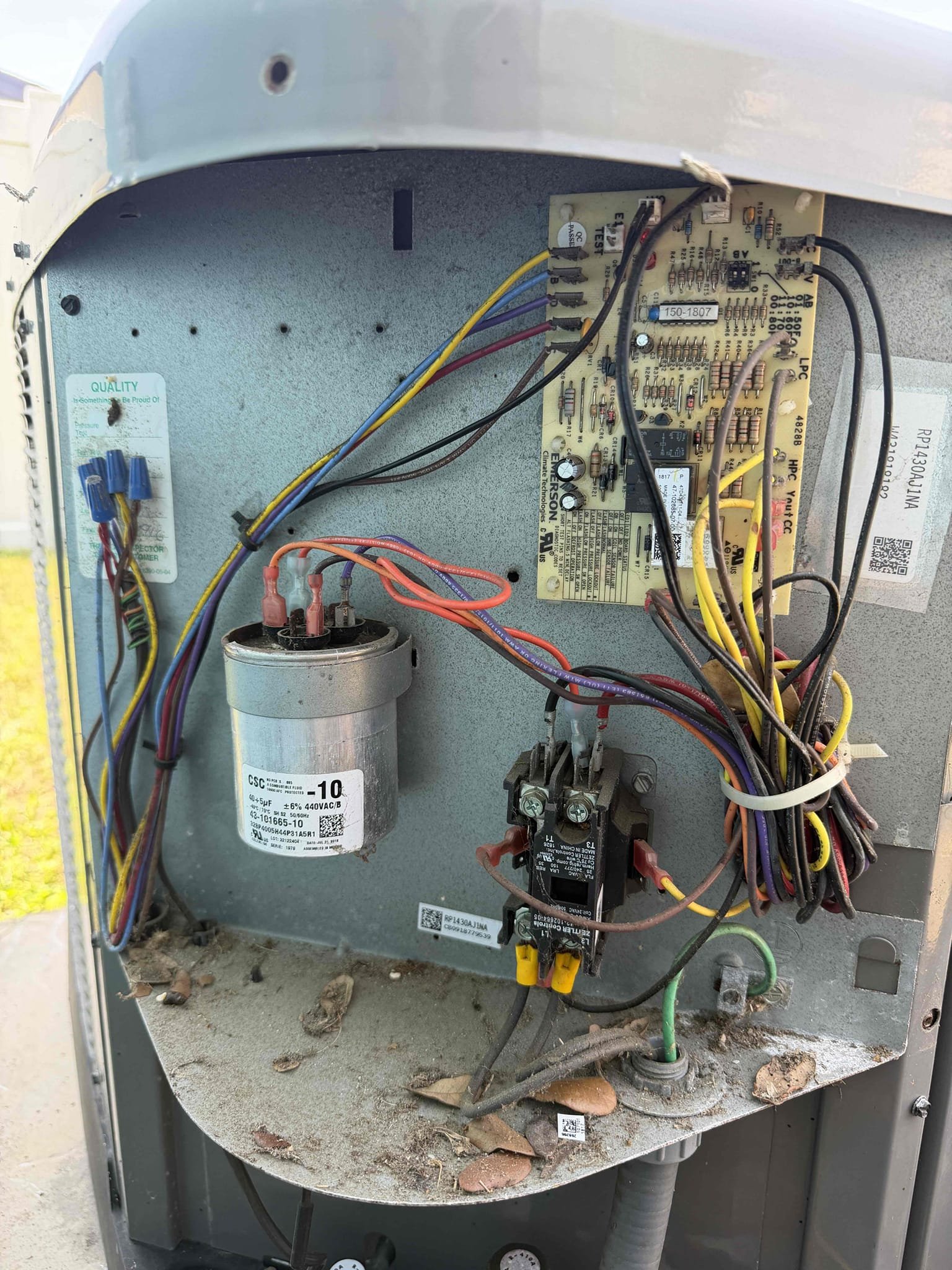 Upon my inspection, found the secondary safety switch in the emergency pan was tripped with water. System does not have a primary safety float switch. Performed a drain cleaning on system. Added a primary safety float switch. Checked pressures and found system slightly low on refrigerant. Added 1 pound of refrigerant. As part of first Maintenence, cleaned condenser coils. System was cooling with a 16° temperature split. It is now cooling with a 18° temperature split. Tested drain line with 1 gallon of water. System is cooling and drain draining as best as it can at this time.

Tested capacitor is within tolerance limits. Checked amp draw on compressor. Checked amp draw on condenser fan motor and found the fan motor is over amping. 